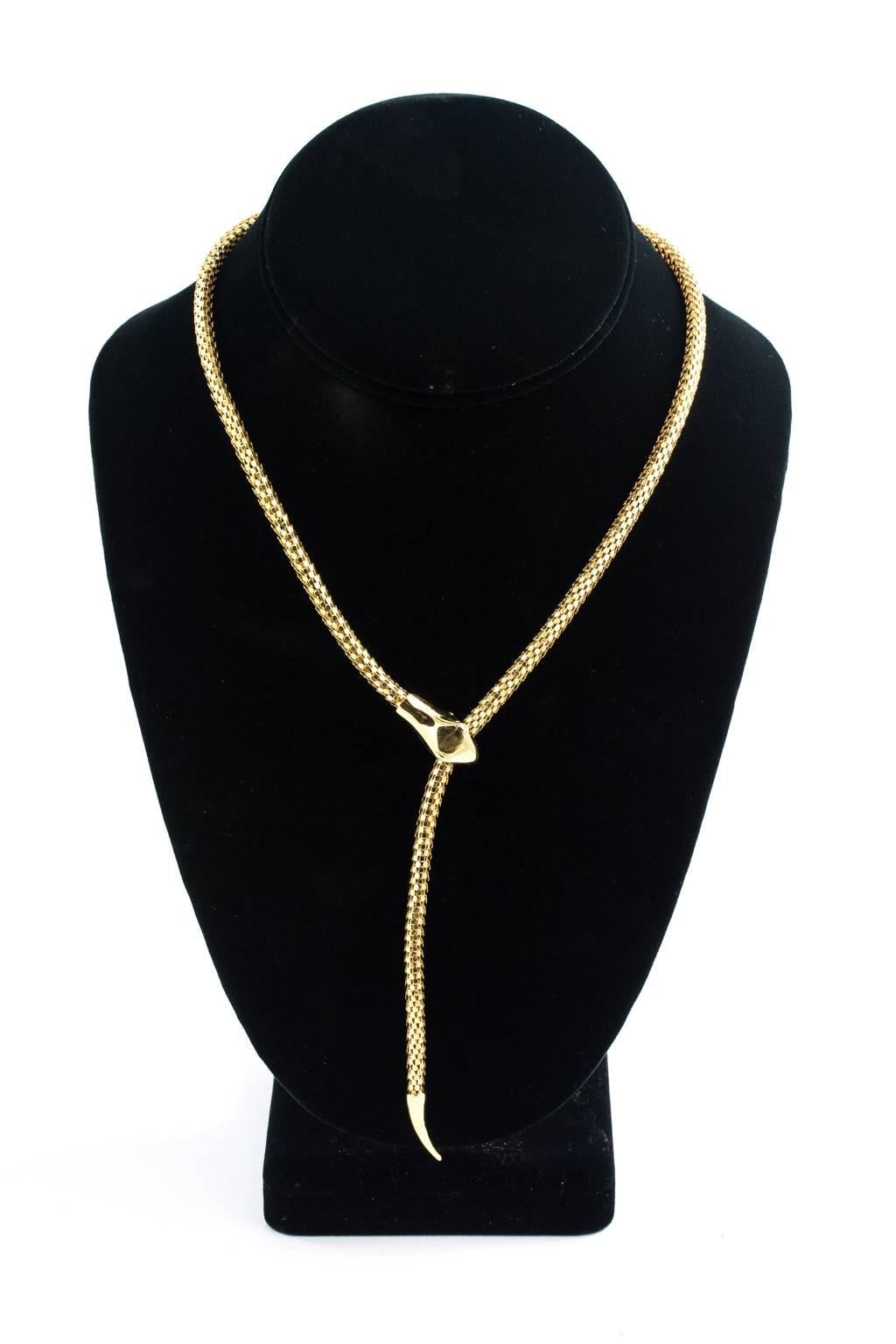 Charming mid-century serpent necklace. Adjusts from the head for the tail length. Hand articulated box mesh design. Snake jewelry is a symbol for good luck. Length-19.00 inches
MATERIALS:Gold
