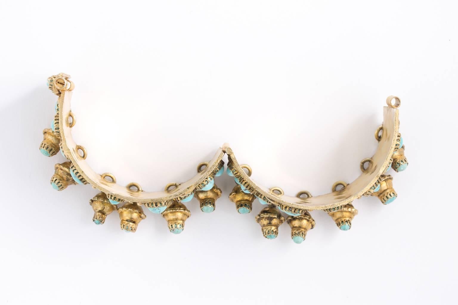 Vintage pre war Persian silver gilt bracelet with beautiful natural Persian turquoise and dangles. A rare form and hand made. Superb workmanship.
FINISH:Gilt
