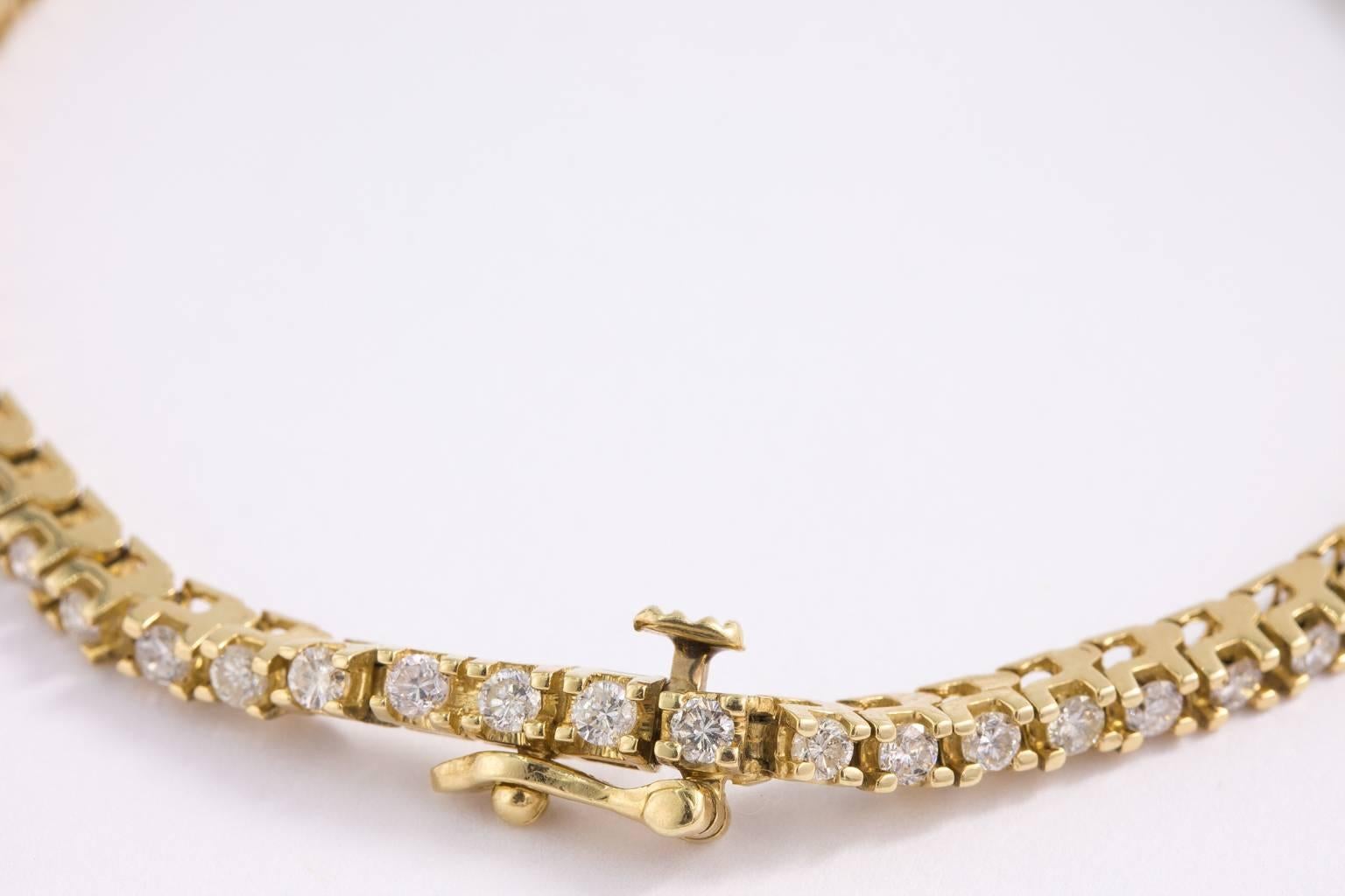 14 Karat Gold and Diamond Tennis Bracelet 1