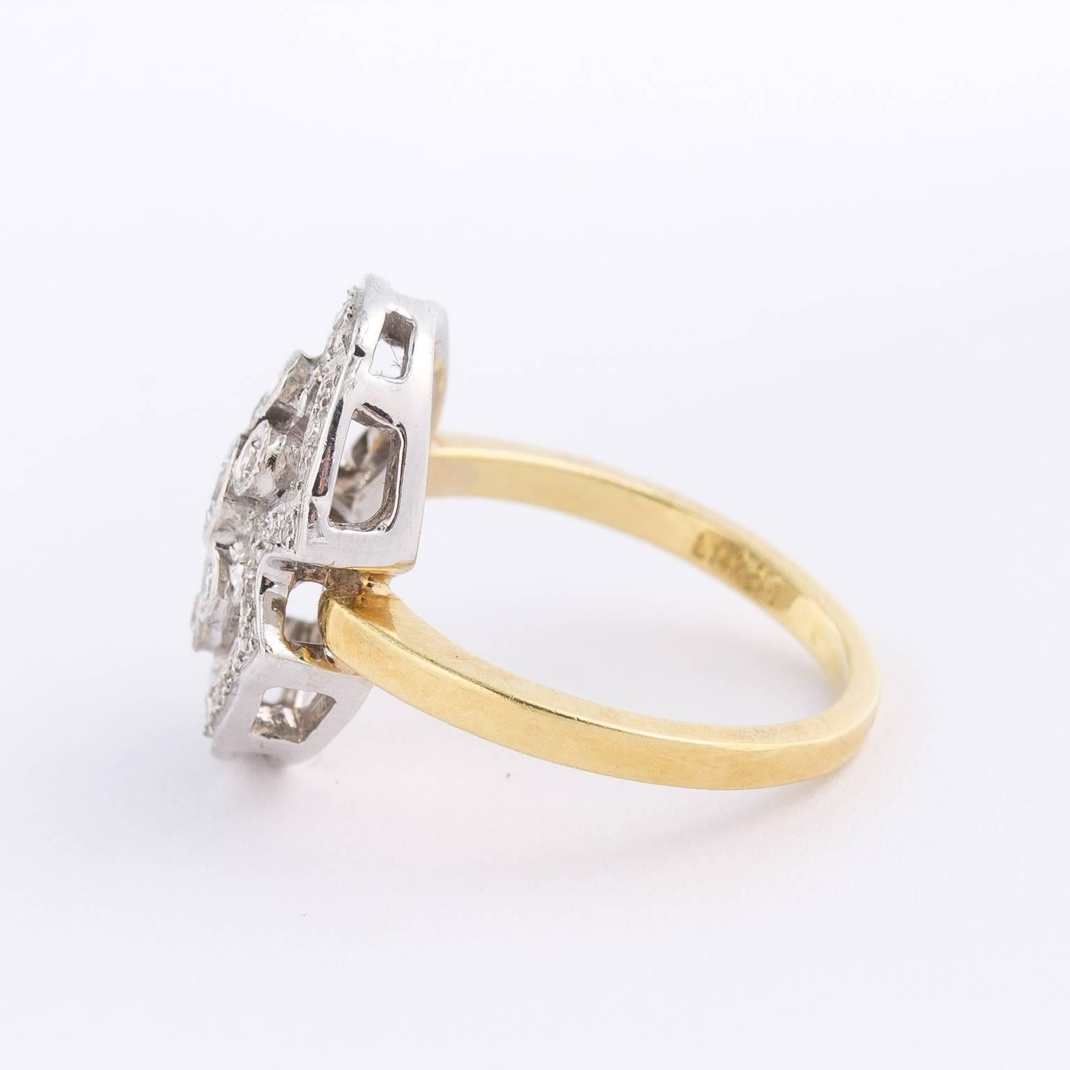  1940s diamond ring on 14KT. with multi vintage diamonds weighing approx 1.75ct in total.Very good quality diamonds. 14kt and diamonds. 1940s. Diamond cocktail ring. Unknown origin.Excellent-wear consistent with age. Size 6 1/2. 
