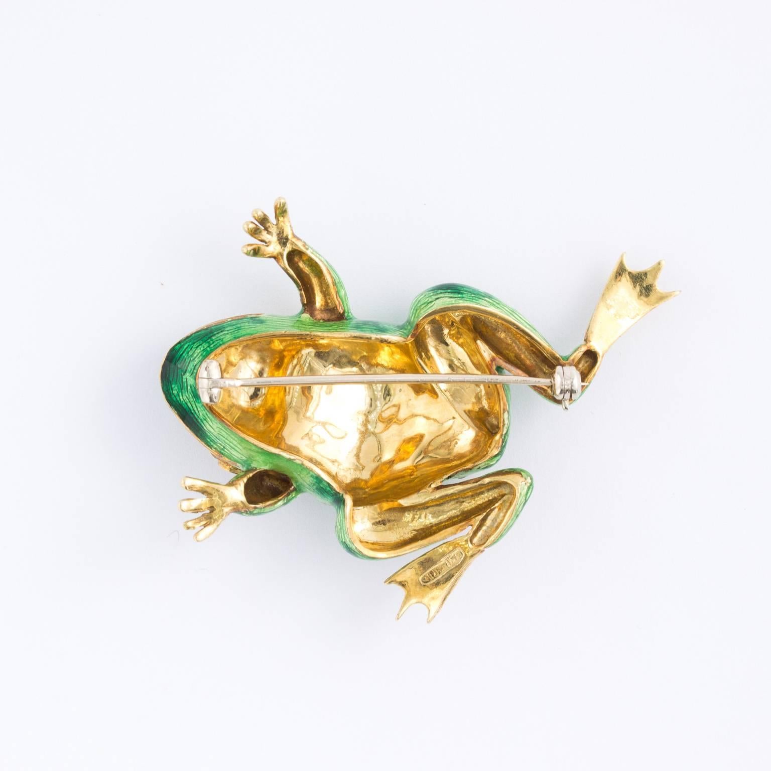 This lovely little frog is wonderfully made with detailed guilloche under green enamel and you can see that on the Frog's back toes. There are also darker green enamel to depict the green dots on frog's back. The eyes are set with two bezel set
