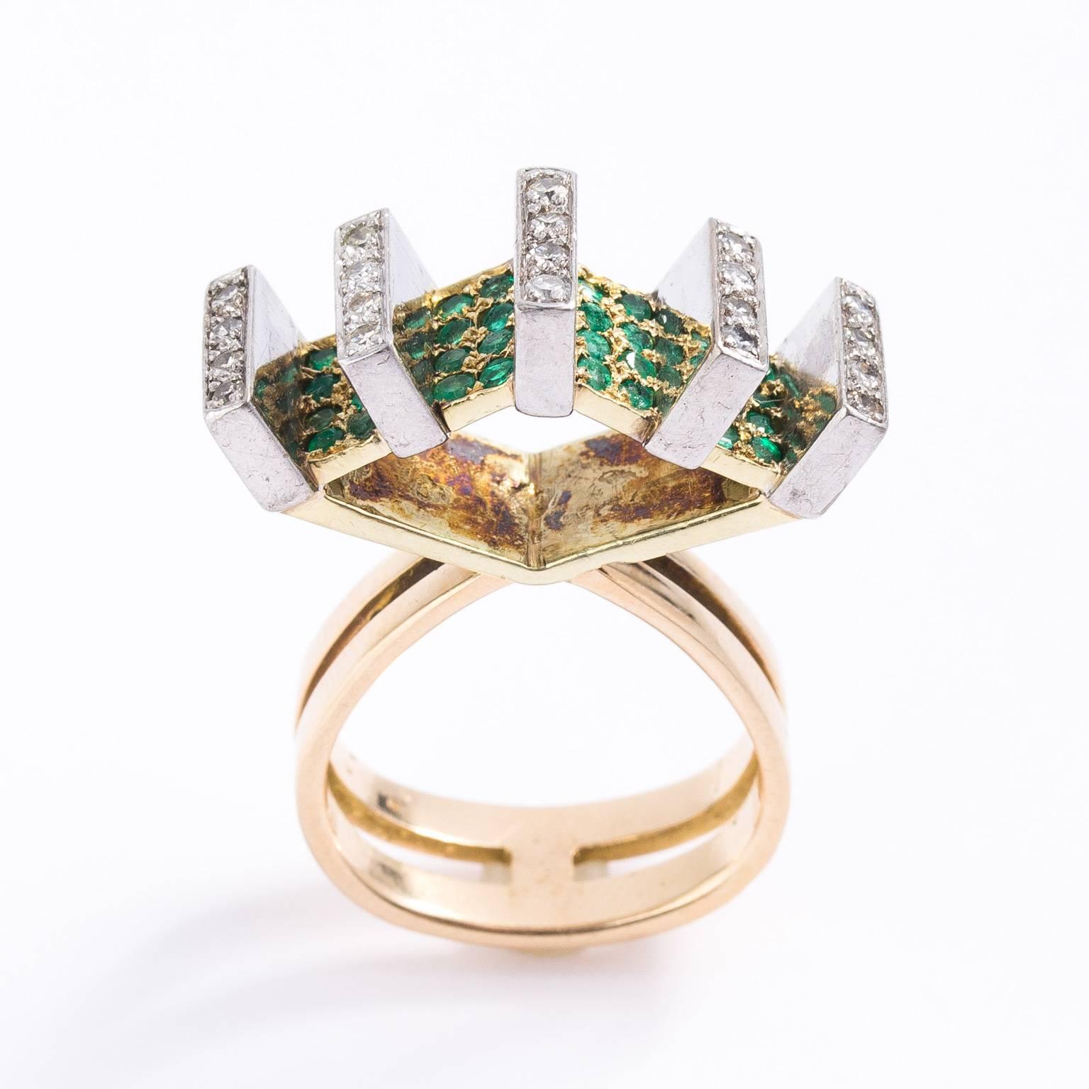 Modernist style ring Ca. 1970's, unusual design comprised of natural emeralds and diamonds in 18 Kt gold setting.  RING SIZE 7 