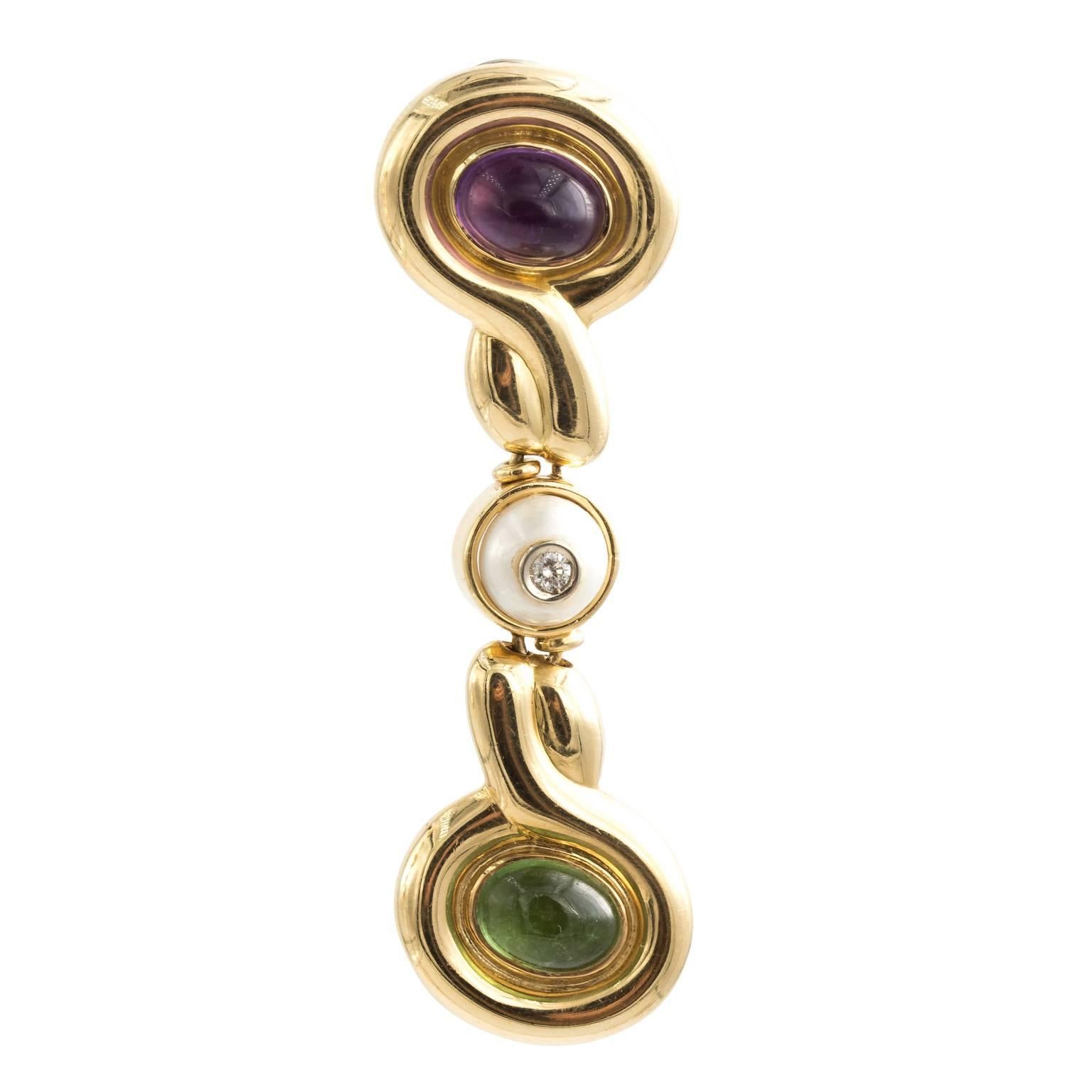 Offered for your consideration are these fabulous earrings from the opulent 1980s. They are constructed from solid yellow gold, 23.5 grams total, that is solid. with four colorful gemstone cabochon. The top are one pink tourmaline and one purple