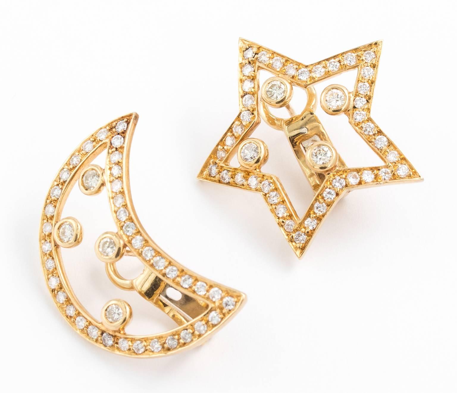 These beautiful earrings are made from 18kt gold and fine diamonds in the shape of a moon and star. Charming and wonderful on with a maker's mark on the back. Mid 20th century.