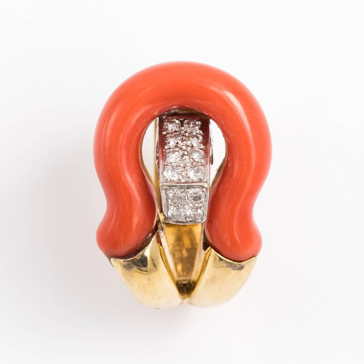 Circa 1980's Italian natural coral earrings with 18kt gold.