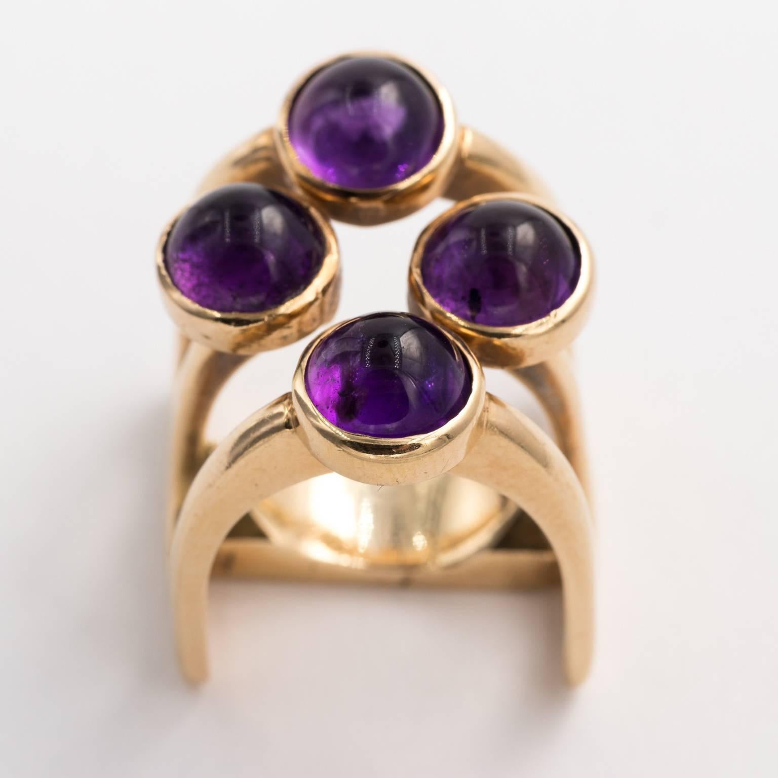 Contemporary handmade studio 14 kt gold abstract ring with amethysts. Ring size 6.75-7 inches.
