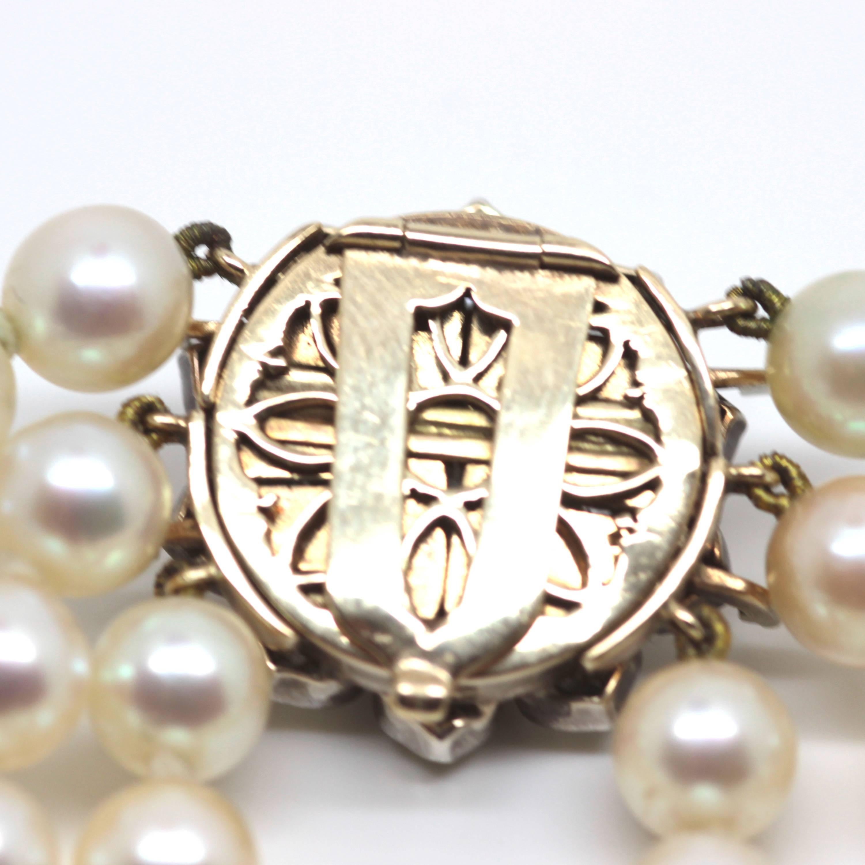1920's Art Deco Triple Strand Pearl Necklace with Antique Diamond Clasp In Excellent Condition For Sale In London, GB
