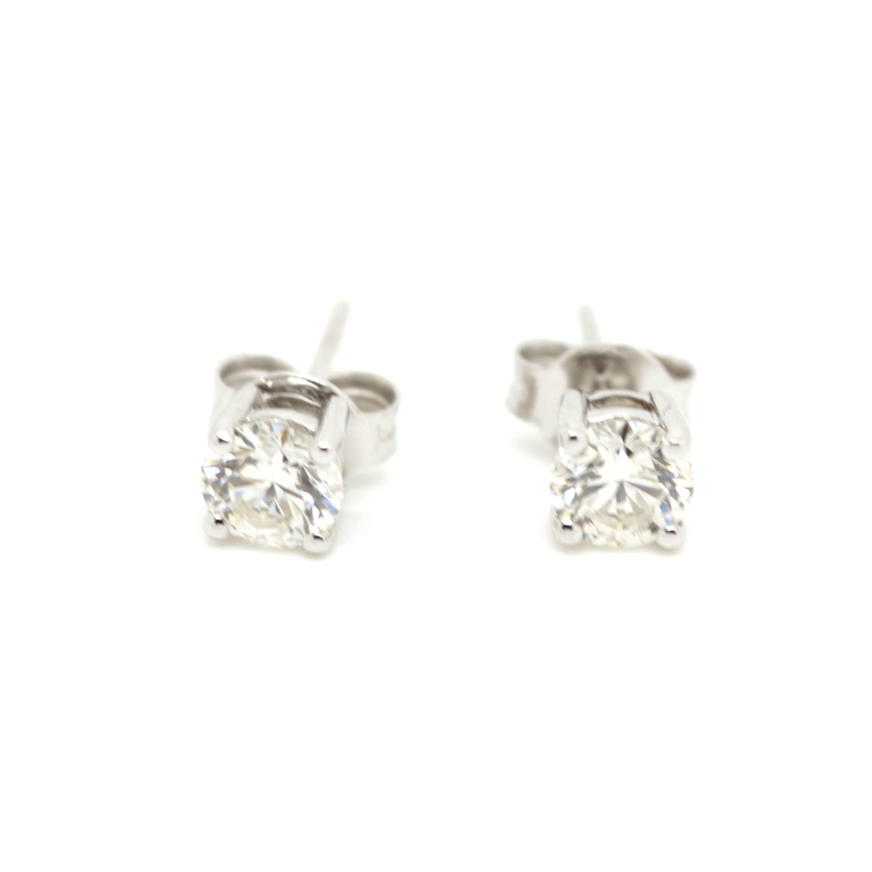 0.5 carat total weight diamond solitaire earrings, set in a 4 claw 18ct white gold setting.  Approximate clarity is VS1/2, approximate colour G/H.  Circa: New Price £3950
