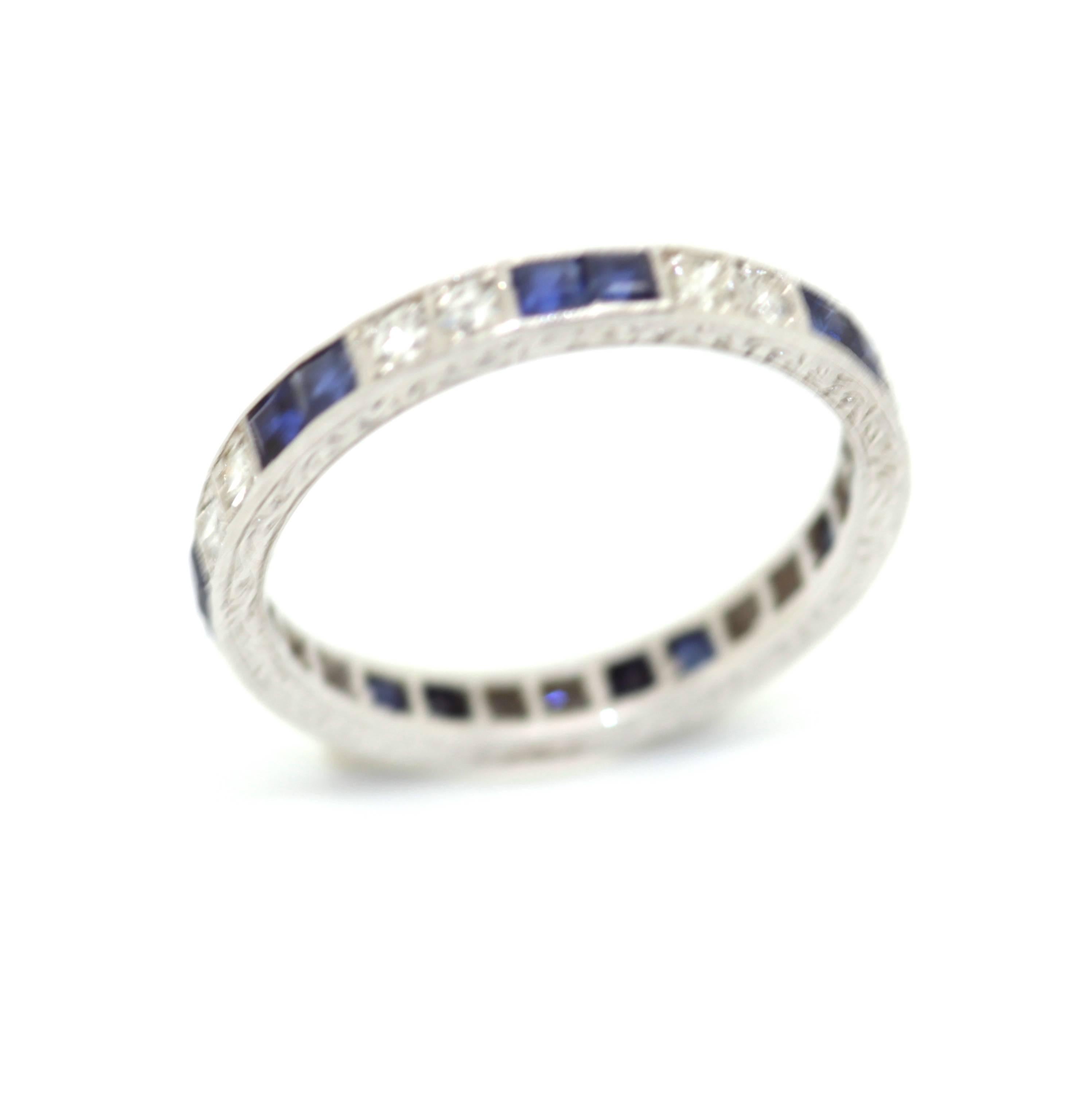 Sapphire diamond eternity ring set in platinum, circa: 1920.