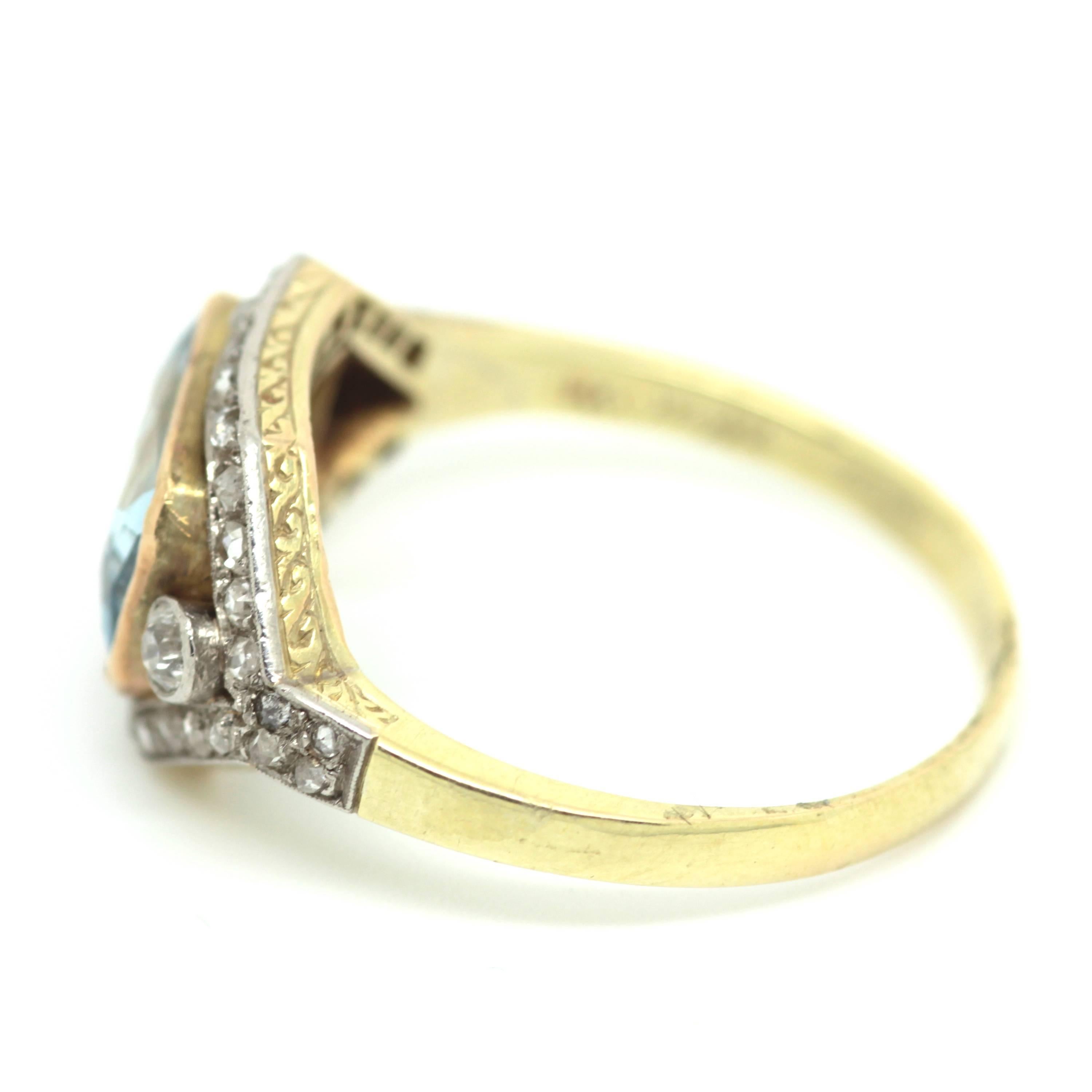 Art deco Aquamarine and diamond ring set in 18ct gold and platinum. Circa: 1920
