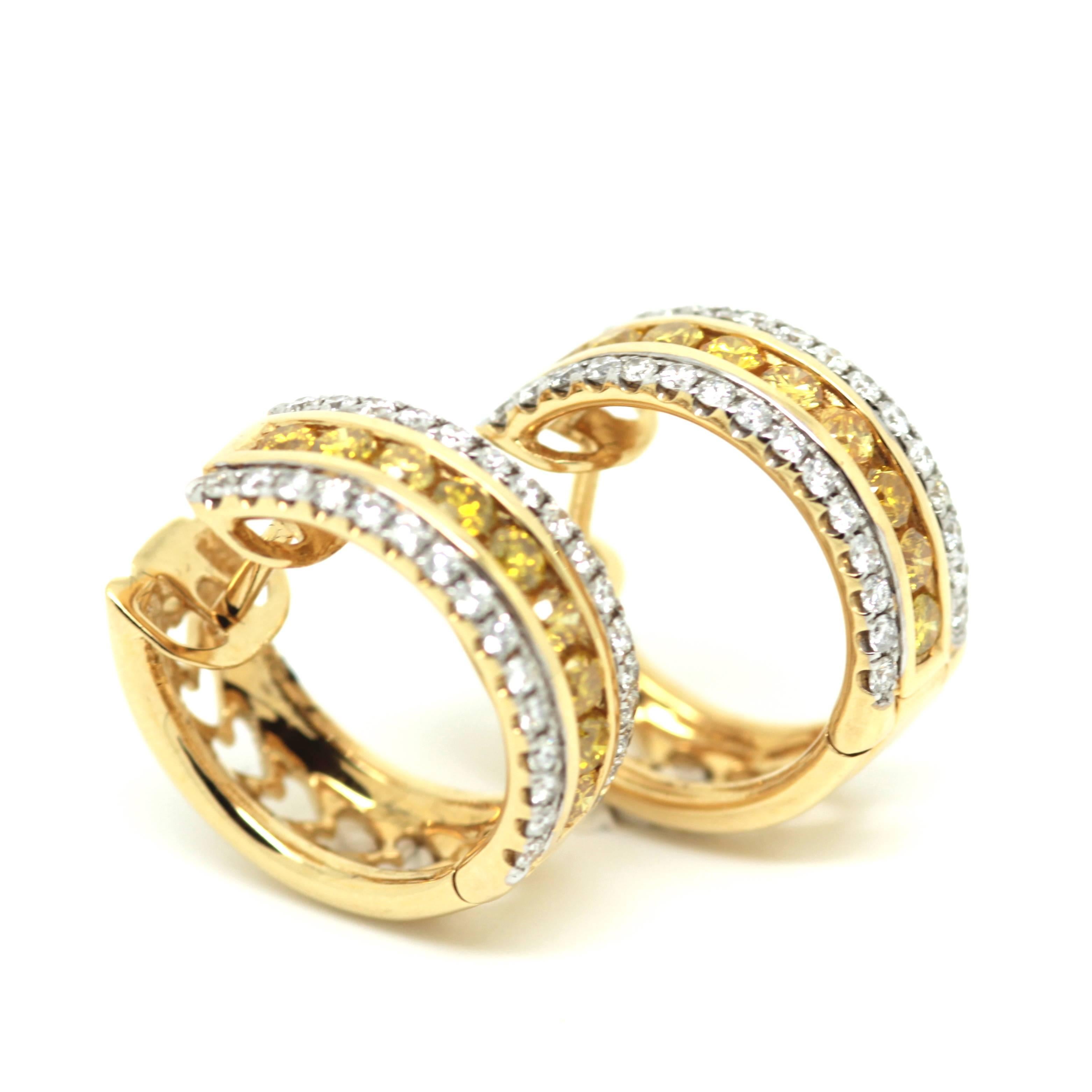 Modern Circular 1.62 Carat Fancy Yellow and White Diamond Earrings For Sale