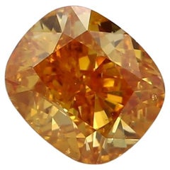 GIA Certified 0.45 Carat Fancy Vivid Yellow Orange I1 Clarity Diamond