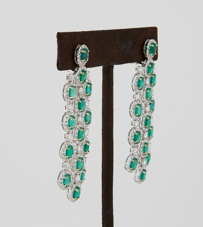 emerald chandelier earrings gold