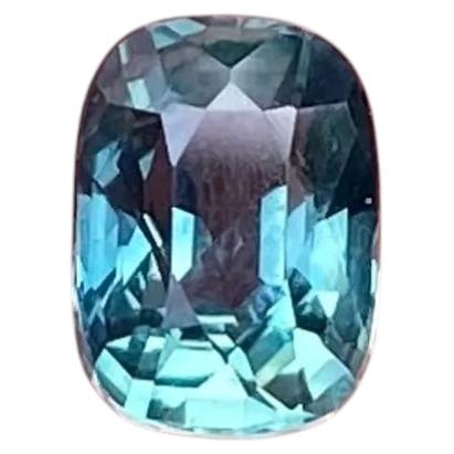 Gema suelta natural «No Heat» de zafiro TEAL de 1.01 ct., talla cojín, con certificado