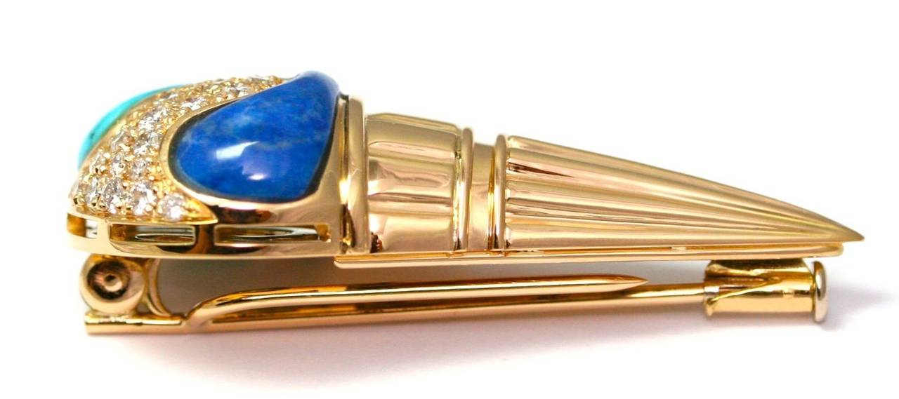 BVLGARI ‘Ice Cream Cone’ circa 1986, Brooch in yellow gold, turquoise, lapis lazuli and diamonds, signed, 44mm(17.9 grams). Bibliography: A. Triossi, Between History and Eternity - Bvlgari 1884 to 2009, cat. Exhibition (Rome, Palazzo delle