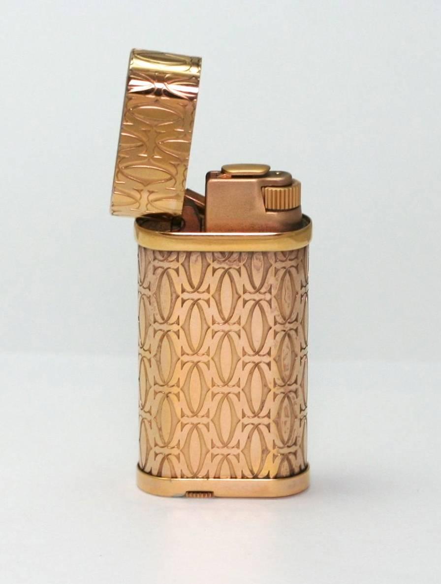 Briquet Cartier métal doré monogramme:: n° 238138:: 2006 avec boîte et certificat