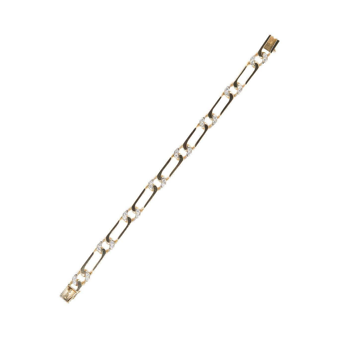 VAN CLEEF & ARPELS Seventies Bracelet yellow gold chain link, six patterns set with diamonds, signed and numbered B2174A66, length 19 cm, width 0,7 cm (34,25 grams)