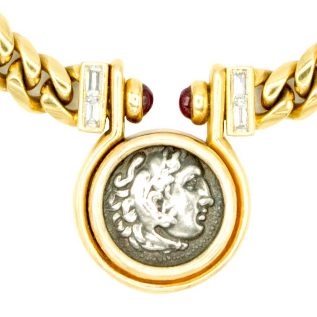 BVLGARI Antique Coin Necklace 70'-80' set with an antique coin, 5 diamonds and 2 rubies. 
Signed. 
(91,15 grs)