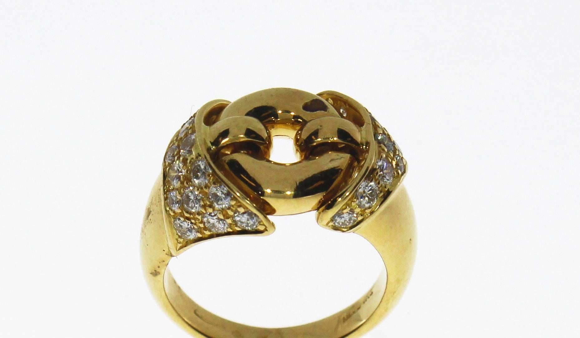 A 18K Yellow Gold and Colorless Diamond vintage Bulgari ring, with  approx 0.54 carat weight in diamonds.

Ring is a size 6 1/2. 