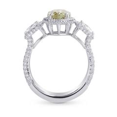 Pear Shape Yellowish Green Three-Stone Diamond Platinum Ring