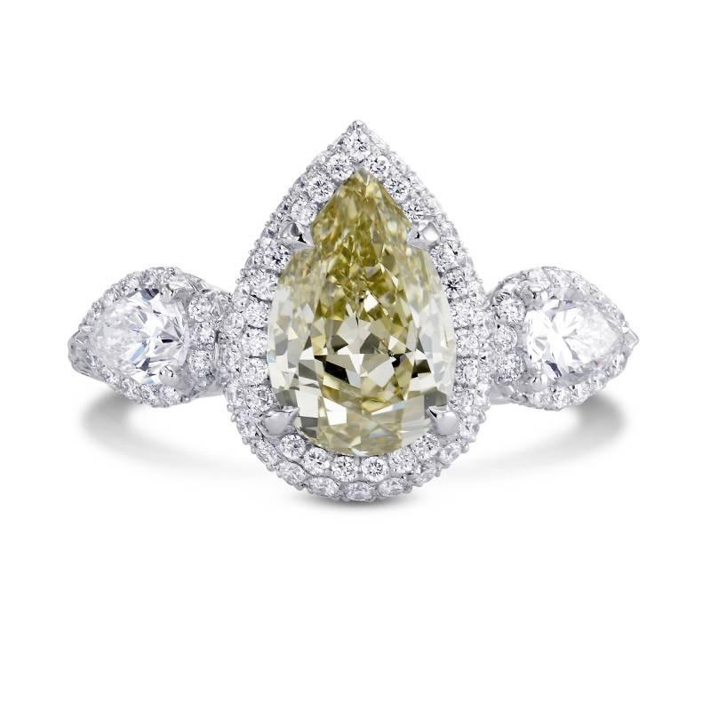 Contemporary Pear Shape Yellowish Green Three-Stone Diamond Platinum Ring For Sale
