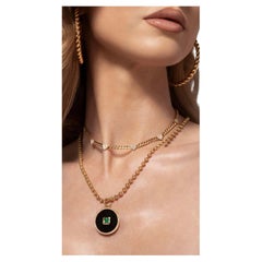 Collier à maillons en or jaune et diamants en forme de coeur