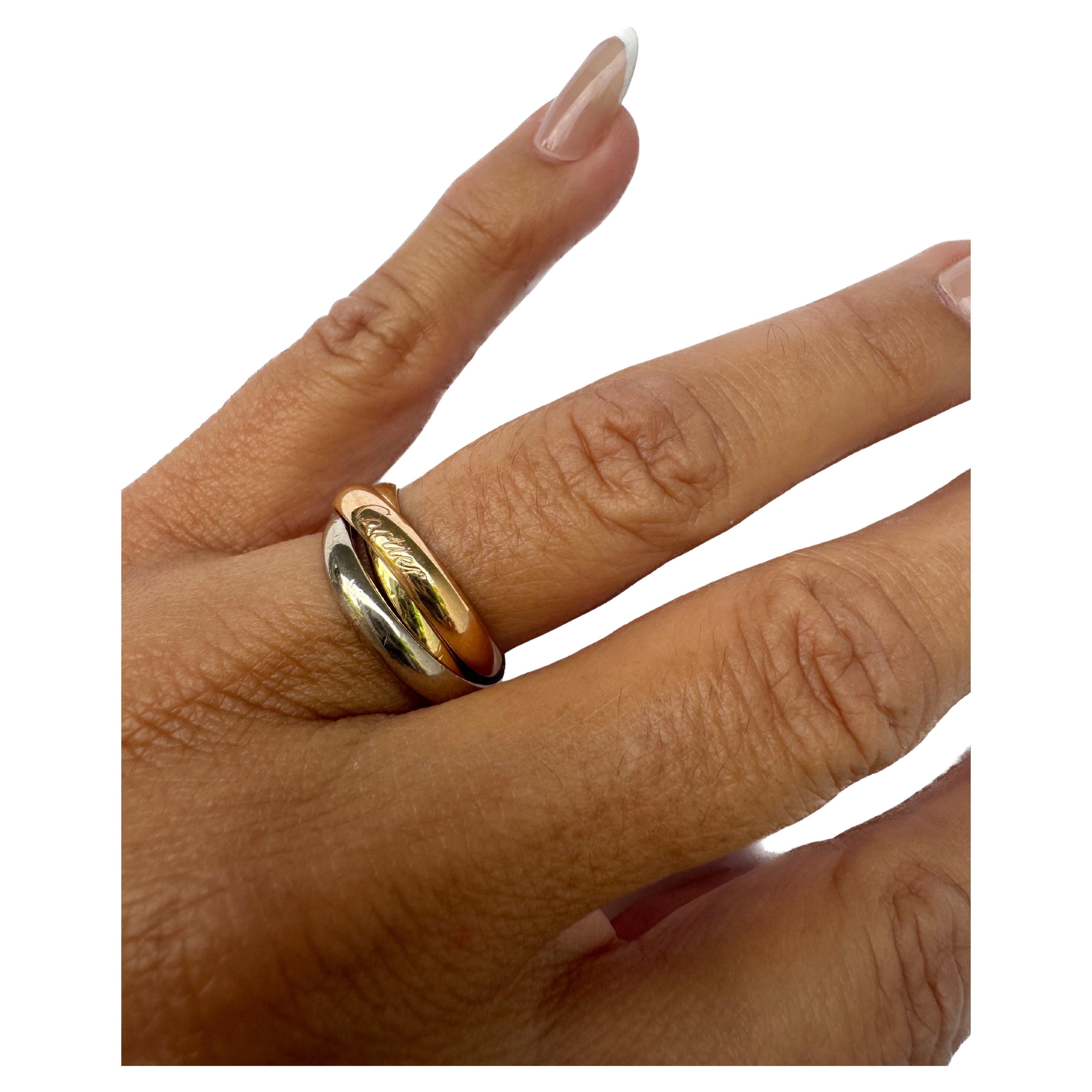 Echt Cartier 18K Gold
-Trinity Gelbgold, Roségold und Weißgold
-mit Zertifikat
-Nicht im Originalkarton enthalten 
-kein Haupt-Edelstein
-hat Gebrauchsspuren 