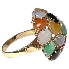 Bague à dôme en or et pierres multicolores