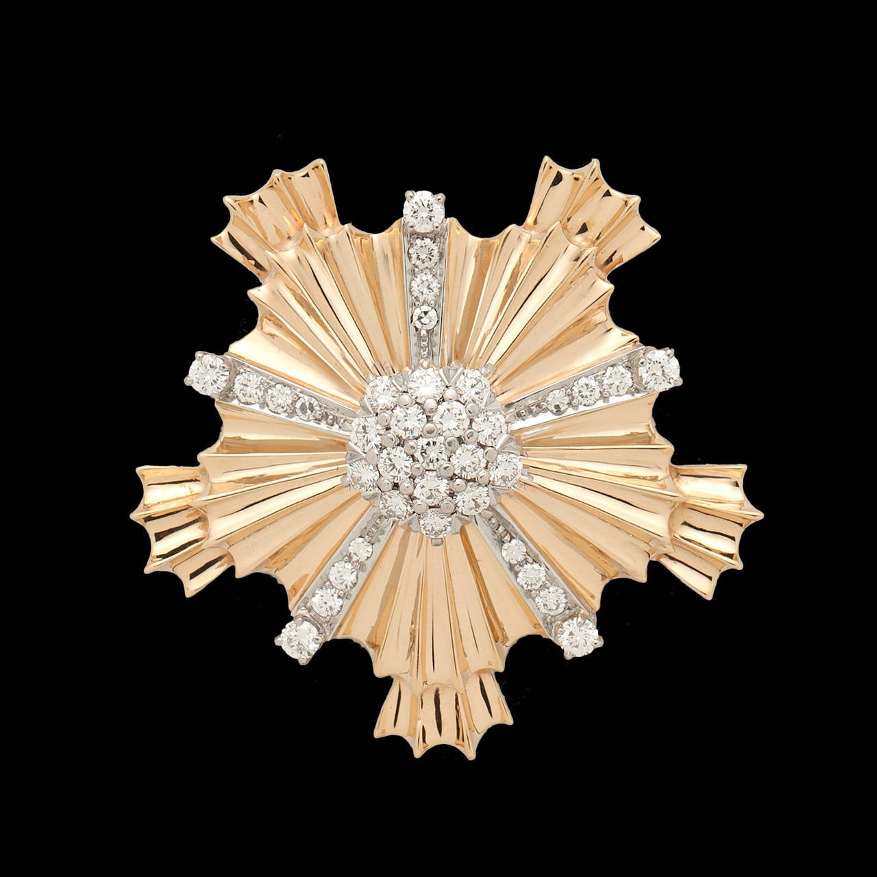 Tiffany & Co. 18Kt Yellow Gold Folded Ribbon Brooch Features 36 Round Brilliant Cut Diamonds for a Total Diamond Weight of approximately 1.92cts. The brooch weighs 21.9 grams.