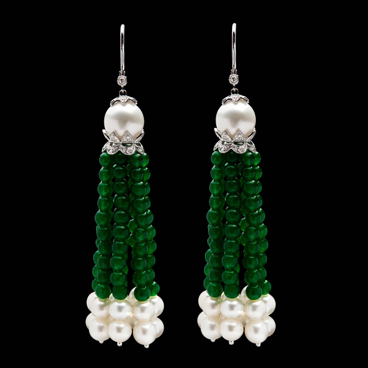 Tassel Earrings Feature Strands of Beads and Cultured Pearls Suspended from an 18Kt White Gold Milgrain Setting Enhanced with Diamonds. The earrings measure approximately 3.25 inches long.
