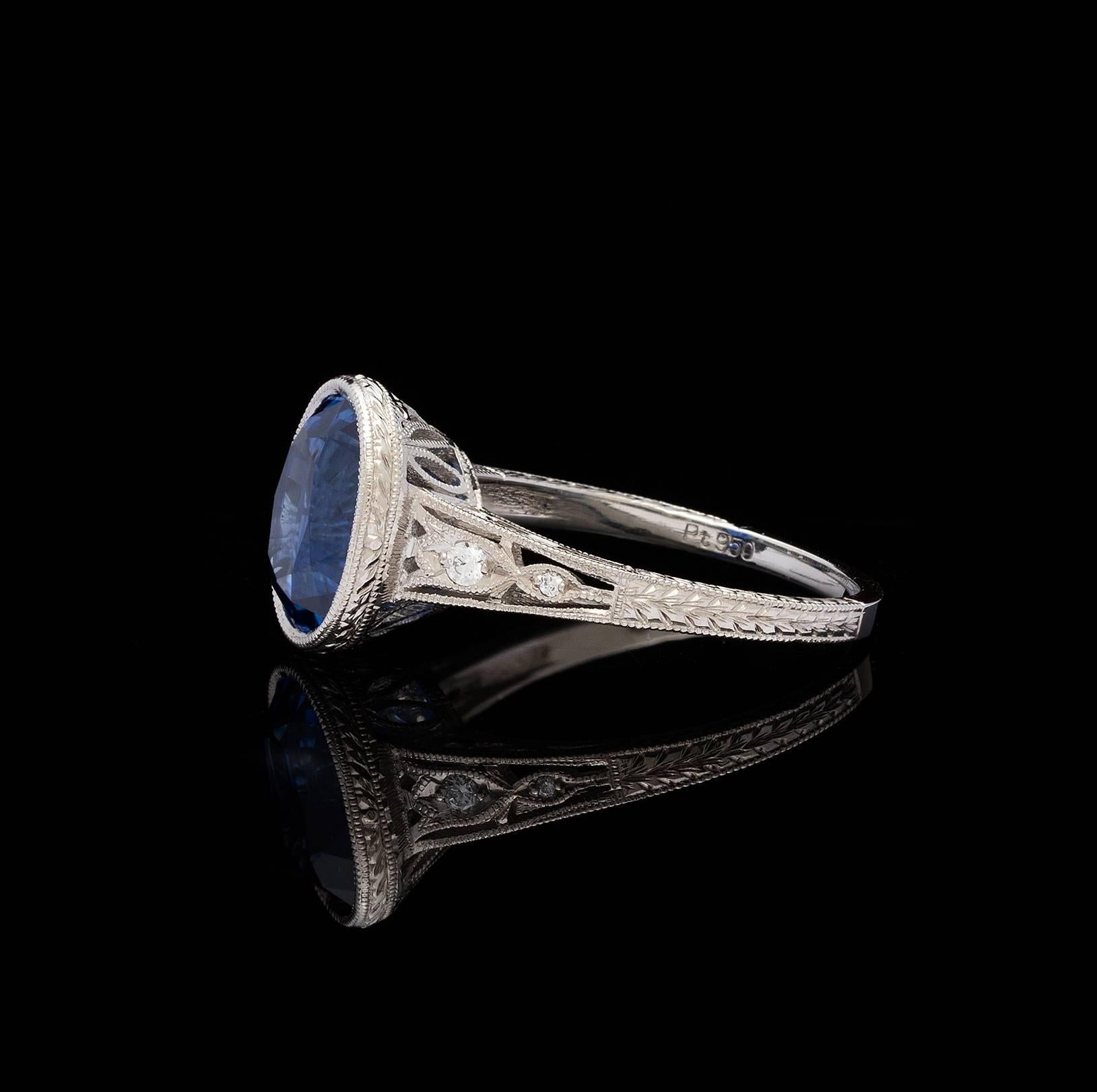 Contemporary AGL Blue Sapphire 4.29 Ct. Diamond Platinum Ring