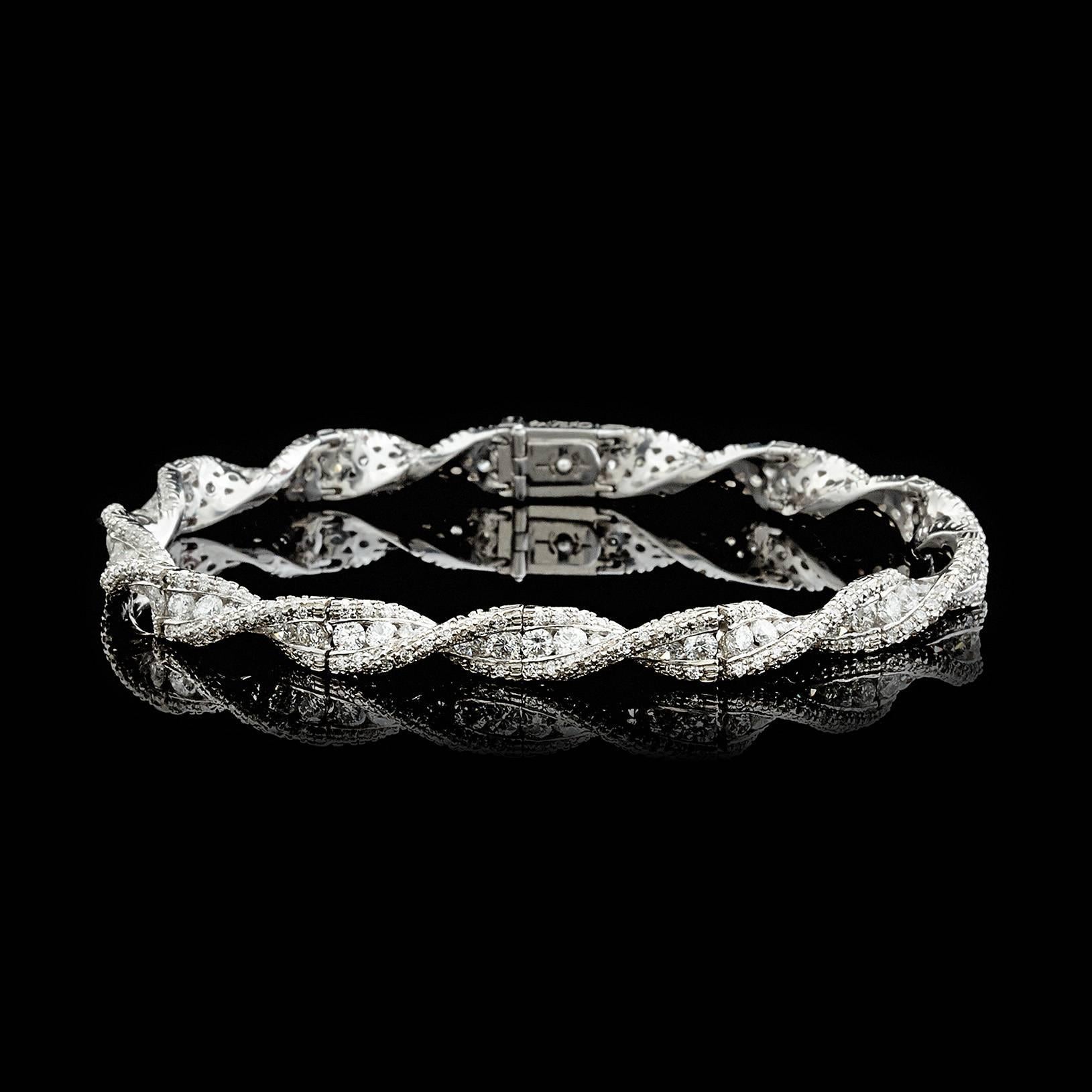 18k white gold Favero diamond bracelet detailed with 6.96 carat total weight of round brilliant cut diamonds crafted in a unique design. This bracelet measures 8 inches long and 1/4 inch wide.  A modern 