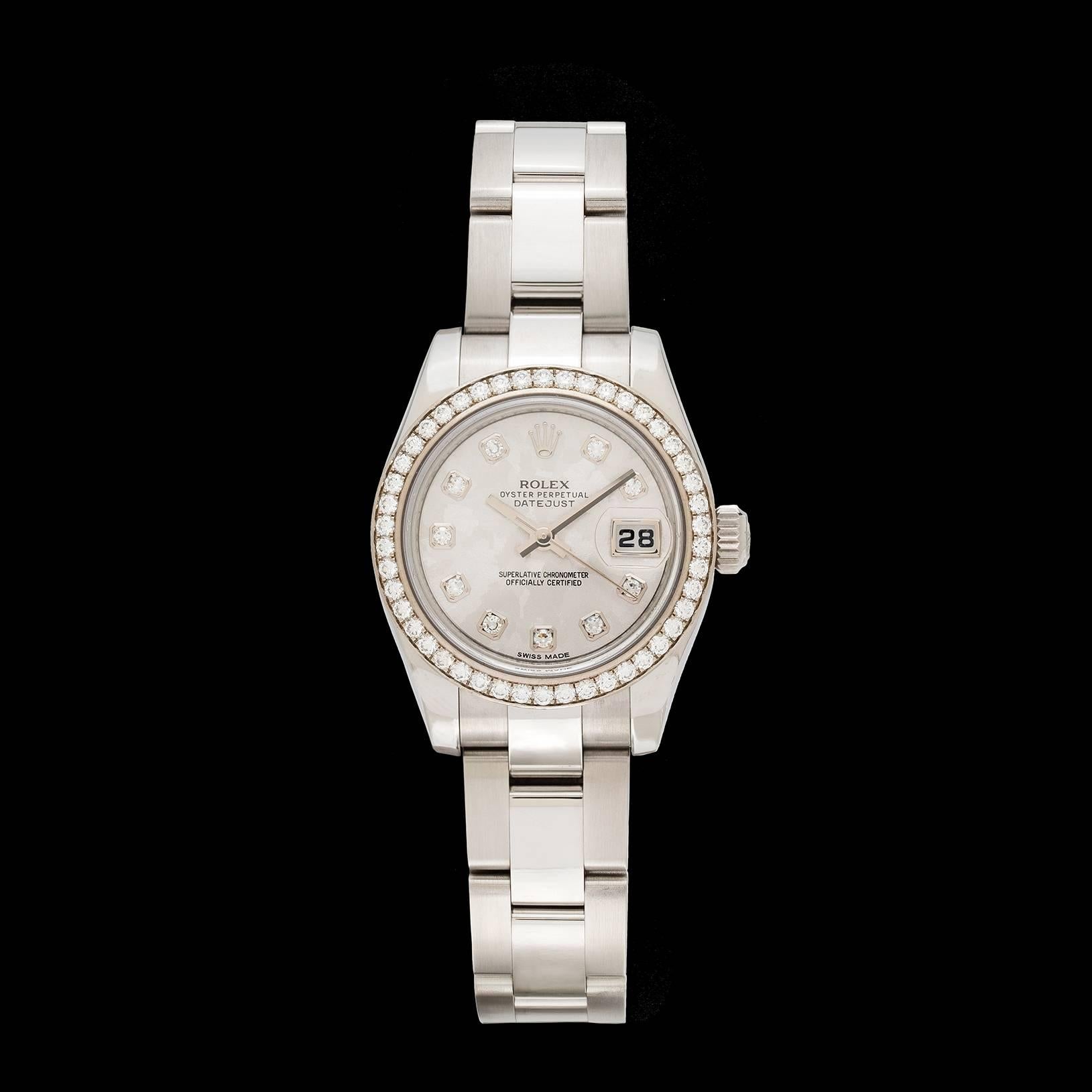 Ladies Rolex 72130 26mm Datejust automatic watch in stainless steel with an 18k white gold diamond bezel, diamond markers, and gray textured dial.  Original box & papers included.  Very elegant timepiece for all occasions.