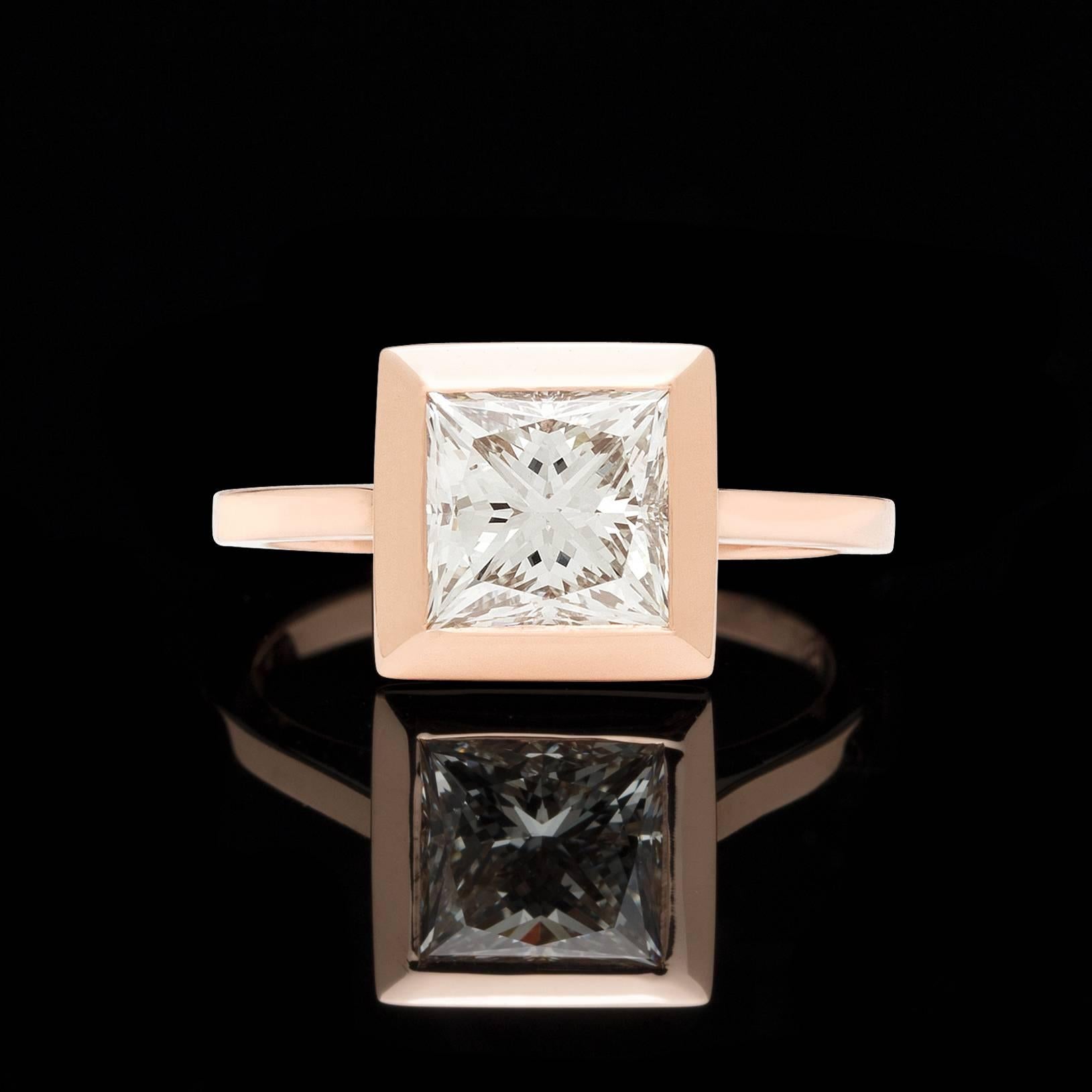 A modern take on the traditional Solitaire Princess Cut Ring. Beautiful Rose Gold helps breathe extraordinary life into this fantastic 2.02 carat GIA graded center stone. Designed specifically for 66mint by our master bench jeweler, this piece was