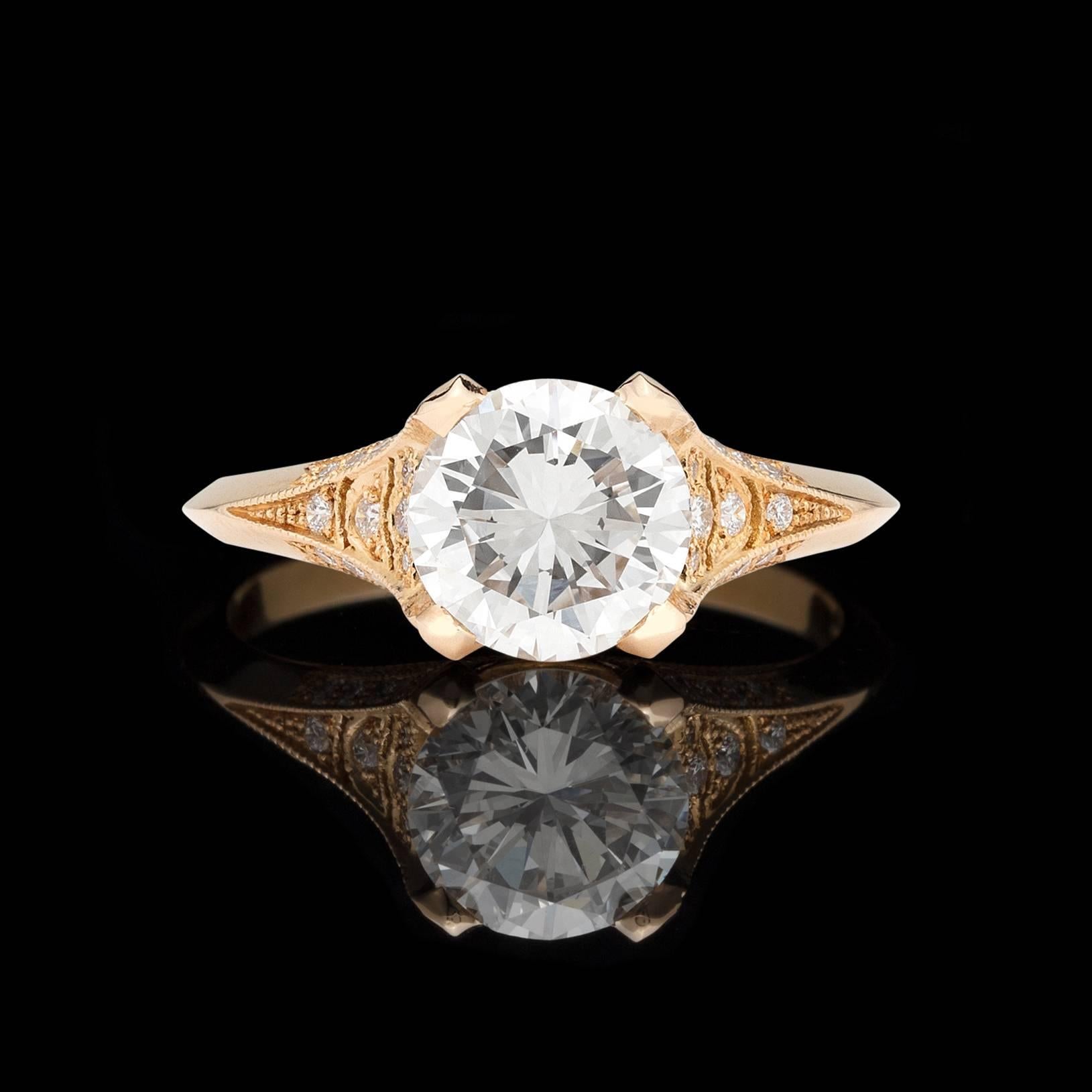 An absolute knockout! This handmade 18 karat Yellow Gold French ring is the perfect combination of fine craftsmanship and fine goods. The center stone is a 1.53 carat GIA graded F/VS1 boasting phenomenal color and clarity along with incredible