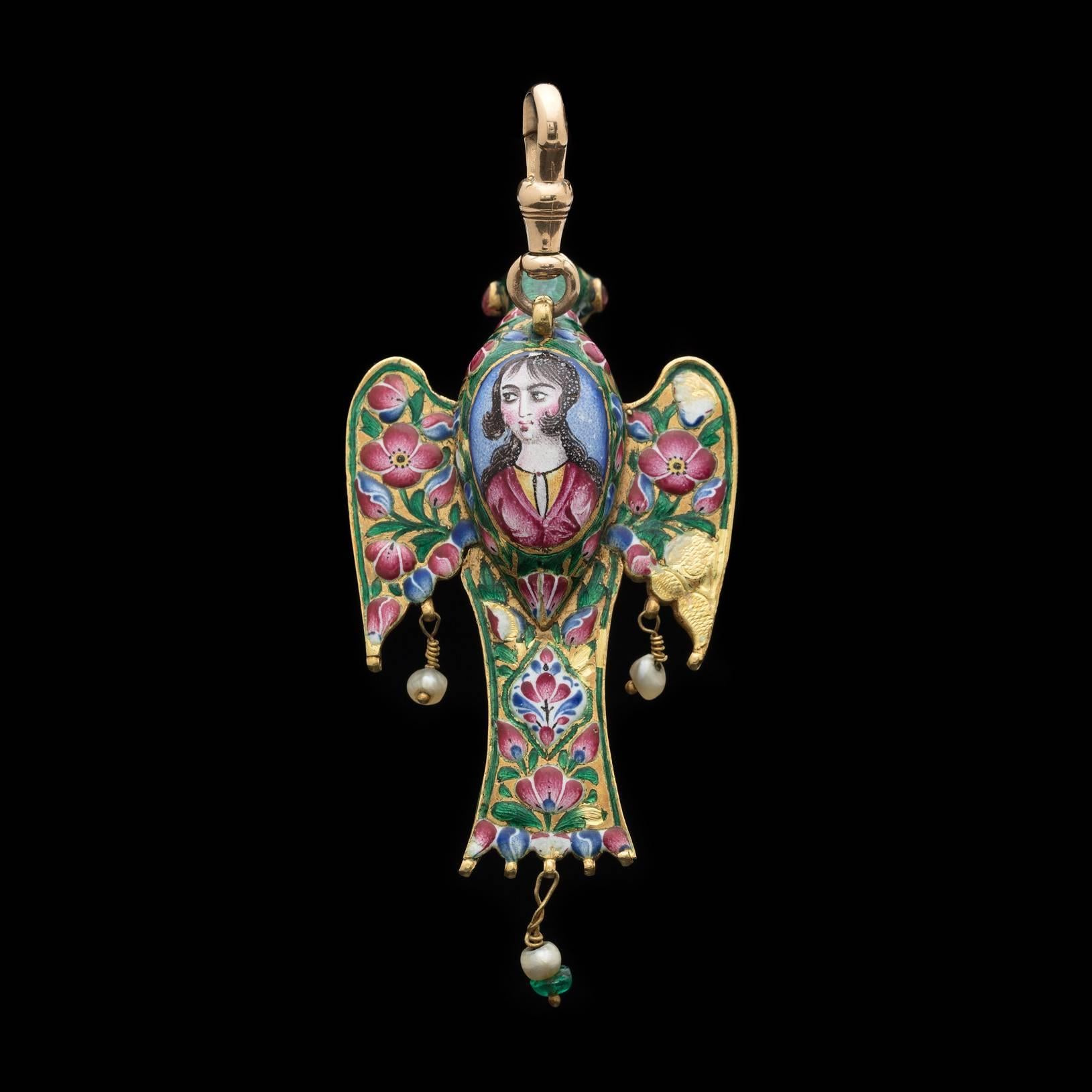 In the shape of a bird, the 22k gold colorfully enameled brooch inset with foil-back hardstones on the front, and a painted enamel portrait on the back, with wings, tail and beak hanging seed pearls, emerald and turquoise. An exceptionally unique