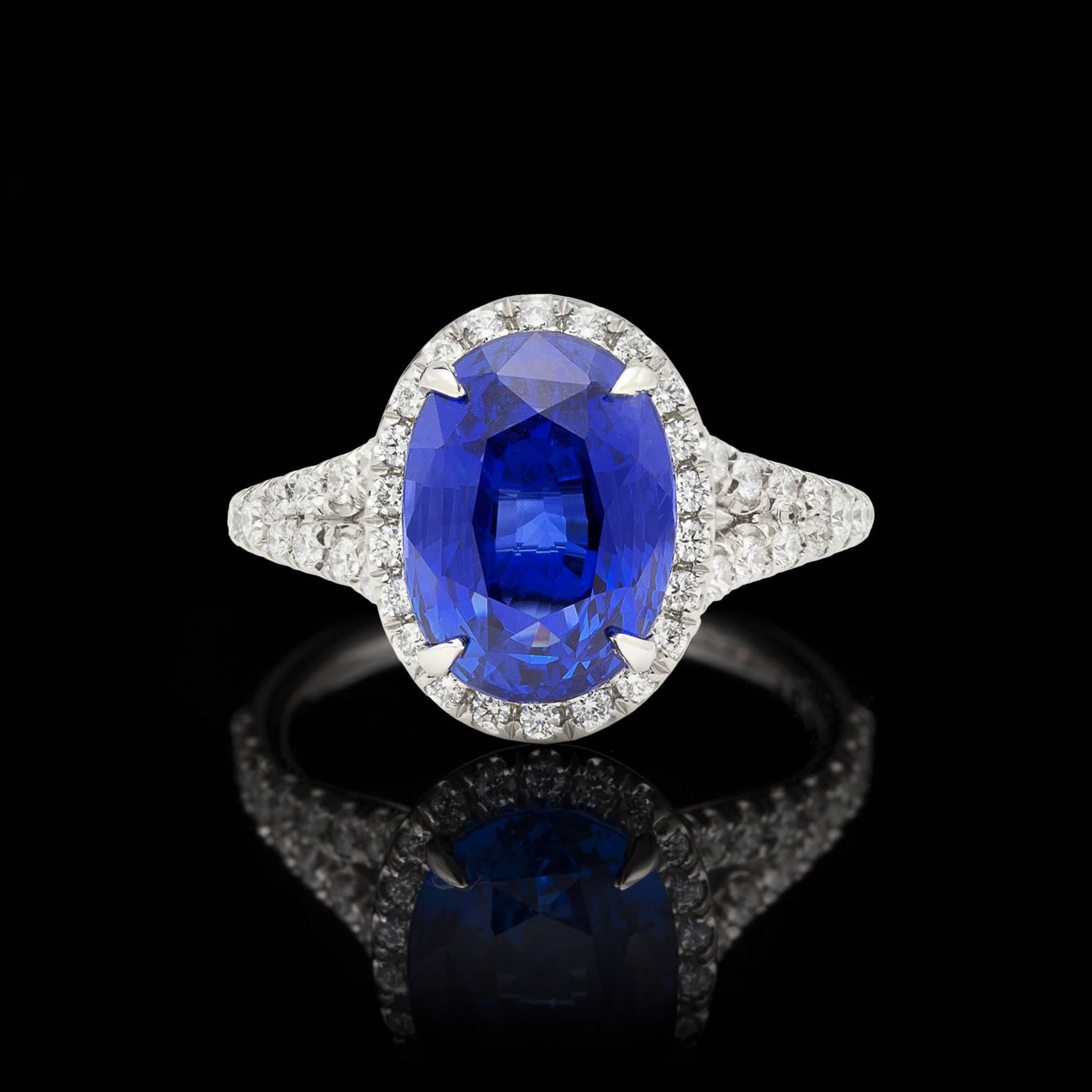 There's blue, and then there is BLUE! This AGL graded Unheated Oval Blue Sapphire sets the standard for how a Natural Blue Sapphire should look. With exceptional light return and rich saturation of color, this 5.08 carat stunner jumps with vibrant