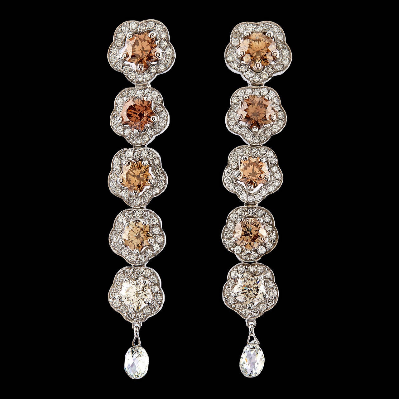 Luca Carati Italian Made Floral Earrings Feature 5.14 Carat Total Weight of Graduated Brown Diamonds Cut as Flowers. The design is enhanced with an additional 2.24 approximate carat total weight of F-G color, VS clarity diamonds. The earrings