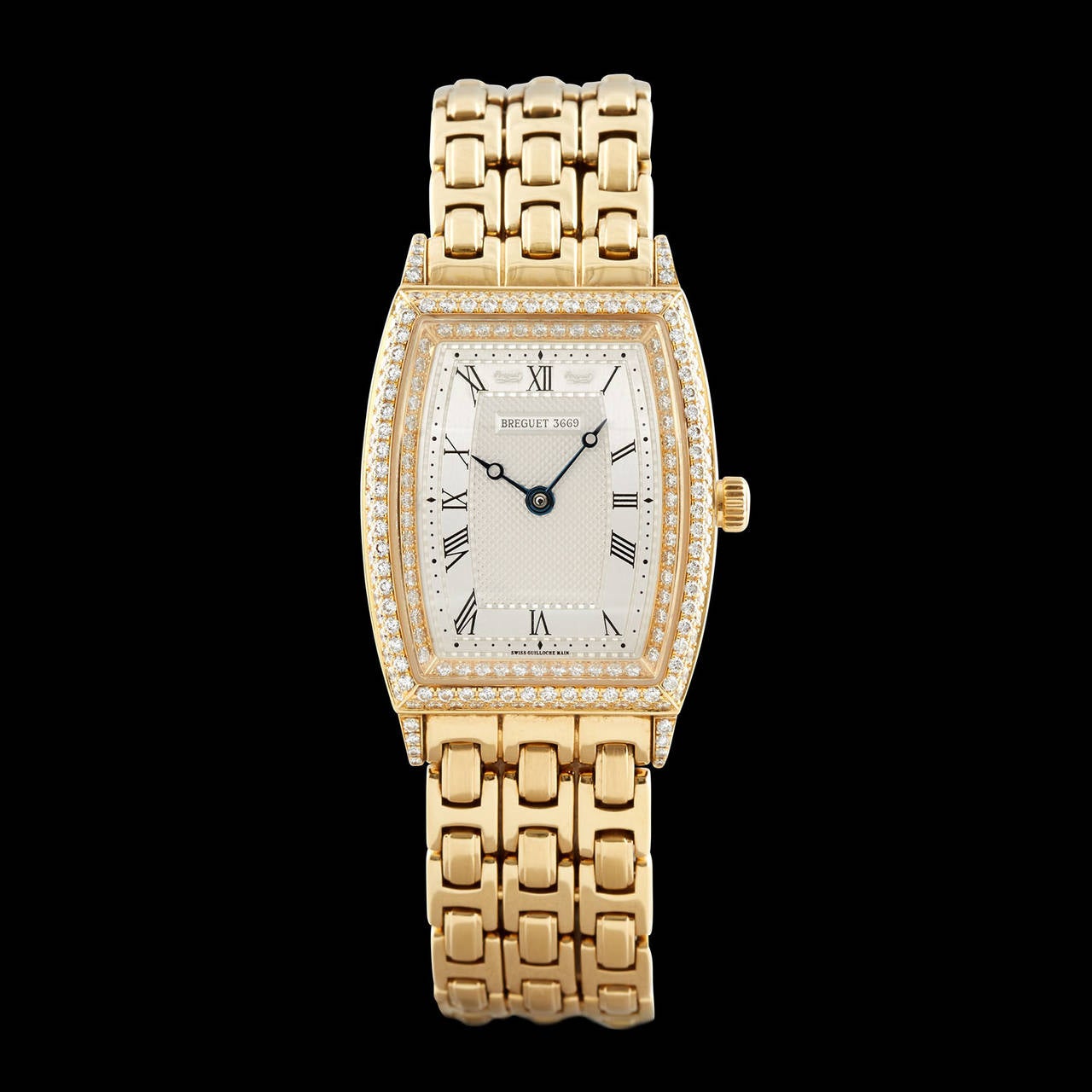 Breguet 18Kt Yellow Gold Women's Watch Features 202 Round Brilliant Cut Diamonds Around the Bezel for Approximately 2.00 Carat Total Weight. The case measures 38mm x 25mm on a 6.5 inch bracelet. This piece is accompanied by the Breguet Certificate