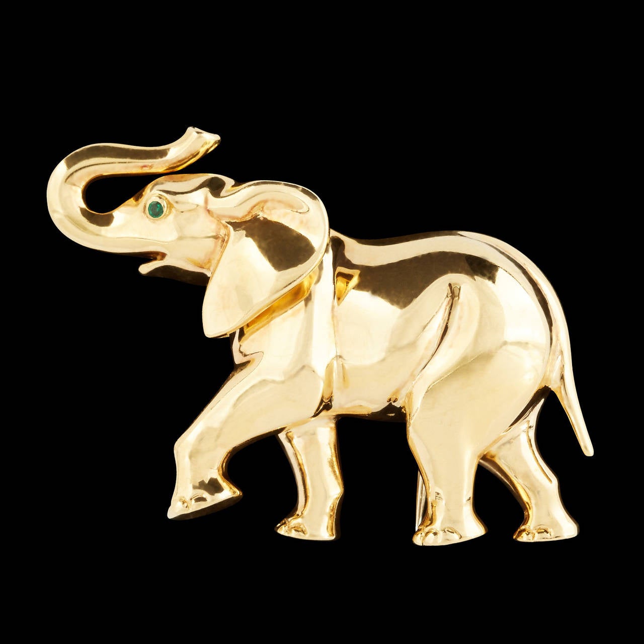 Cartier Beautifully Crafted 18Kt Yellow Gold Elephant Brooch with Emerald Eyes. The piece measures approximately 2 inches by 1.5 inches and weighs 24.1 grams.