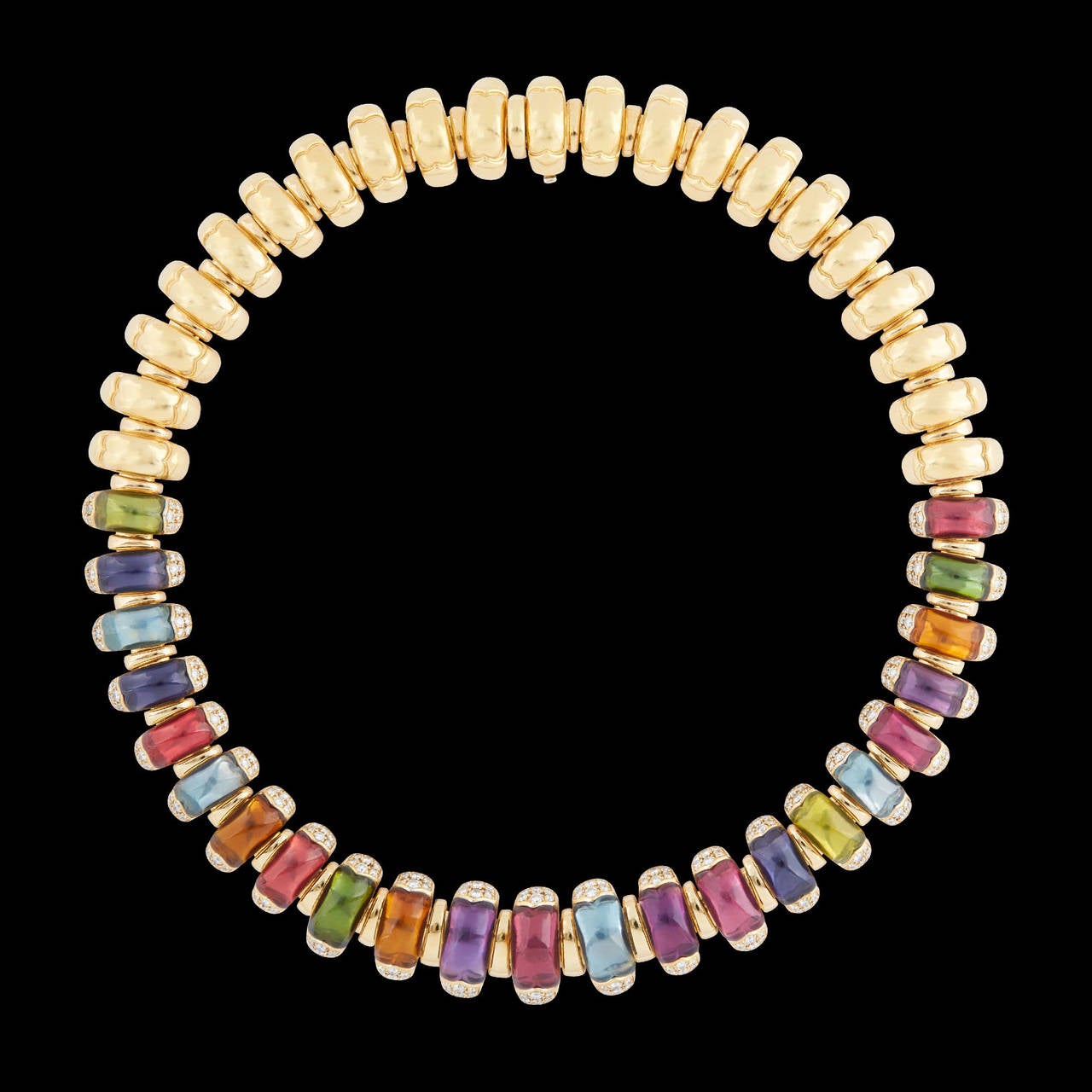 Stunning Bulgari 18Kt Yellow Gold Necklace of Arched Links in an Array of Vibrant Colors with approximately 2.90 carat total weight of round brilliant cut diamonds and 44.00 carat total weight of Semi Precious Gemstones. The necklace measures 15