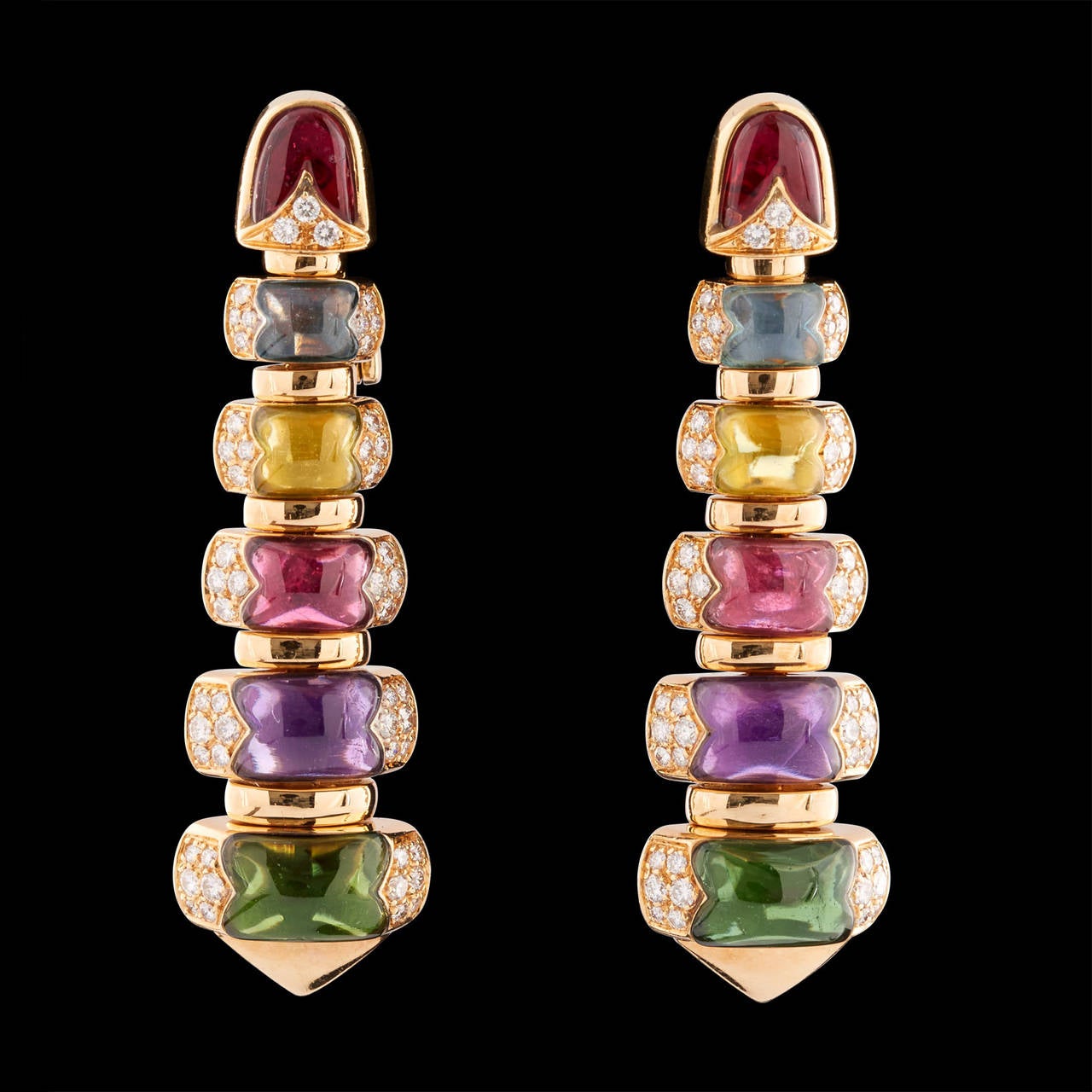 Pair of 18Kt Yellow Gold 'Celtica' Earrings by Bulgari Featuring Multi-Colored Gems & 108 Pave Diamonds totaling 1.52 carats. The colored gems featured are amethyst, peridot, varied colored tourmalines and topaz. The earrings measure approximately 2
