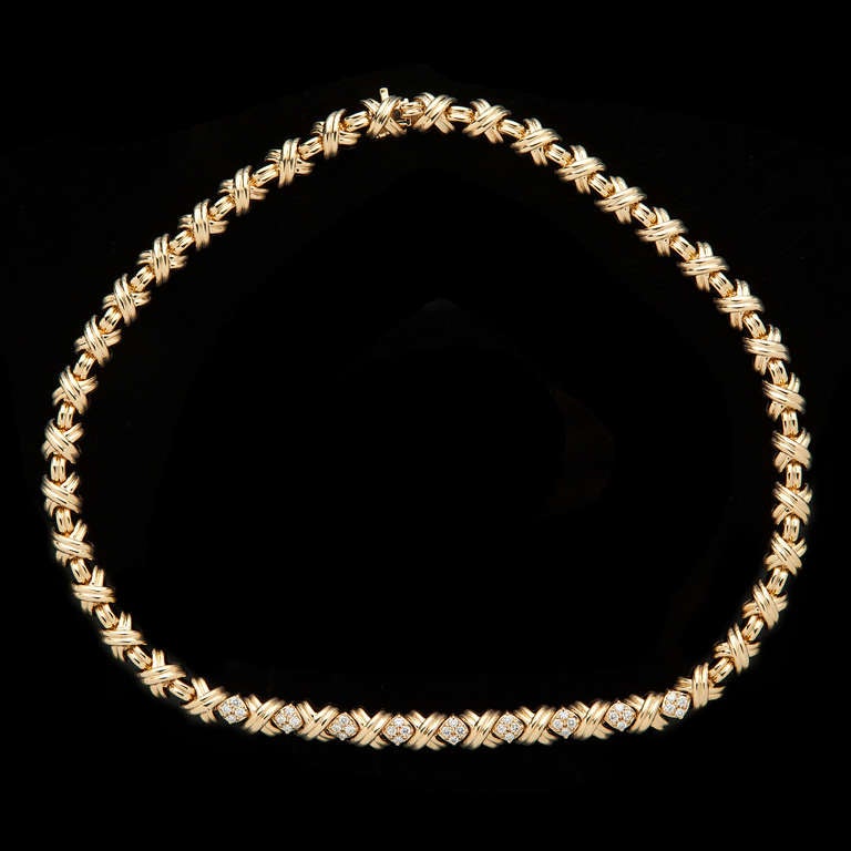 Estate Tiffany & Co. 18Kt Yellow Gold Necklace Features 36 Round Brilliant Cut Diamonds for approximately 1.00ct.  This beautiful necklace measures 16.75 inches and weighs 67.3 grams.