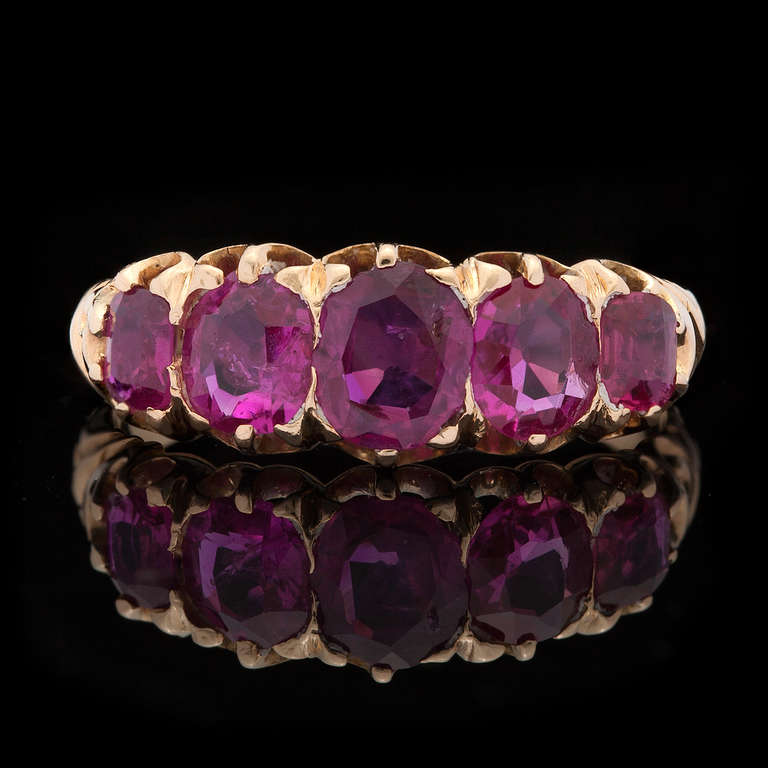 Beautiful Victorian Ring Features 5 Oval Cut Rubies, for approximately 1.30cts, Set in 14Kt Yellow Gold.  The ring measures 3-7mm in width and is a size 6.0, weighing 2.6 grams.