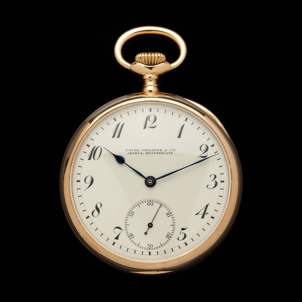 Patek Philippe 18k Yellow Gold Pocket Watch, Retailed by Shreve Crump & Low, with Silvered Dial and Stylized Arabic Numbers. The watch has an eighteen-jewel movement.