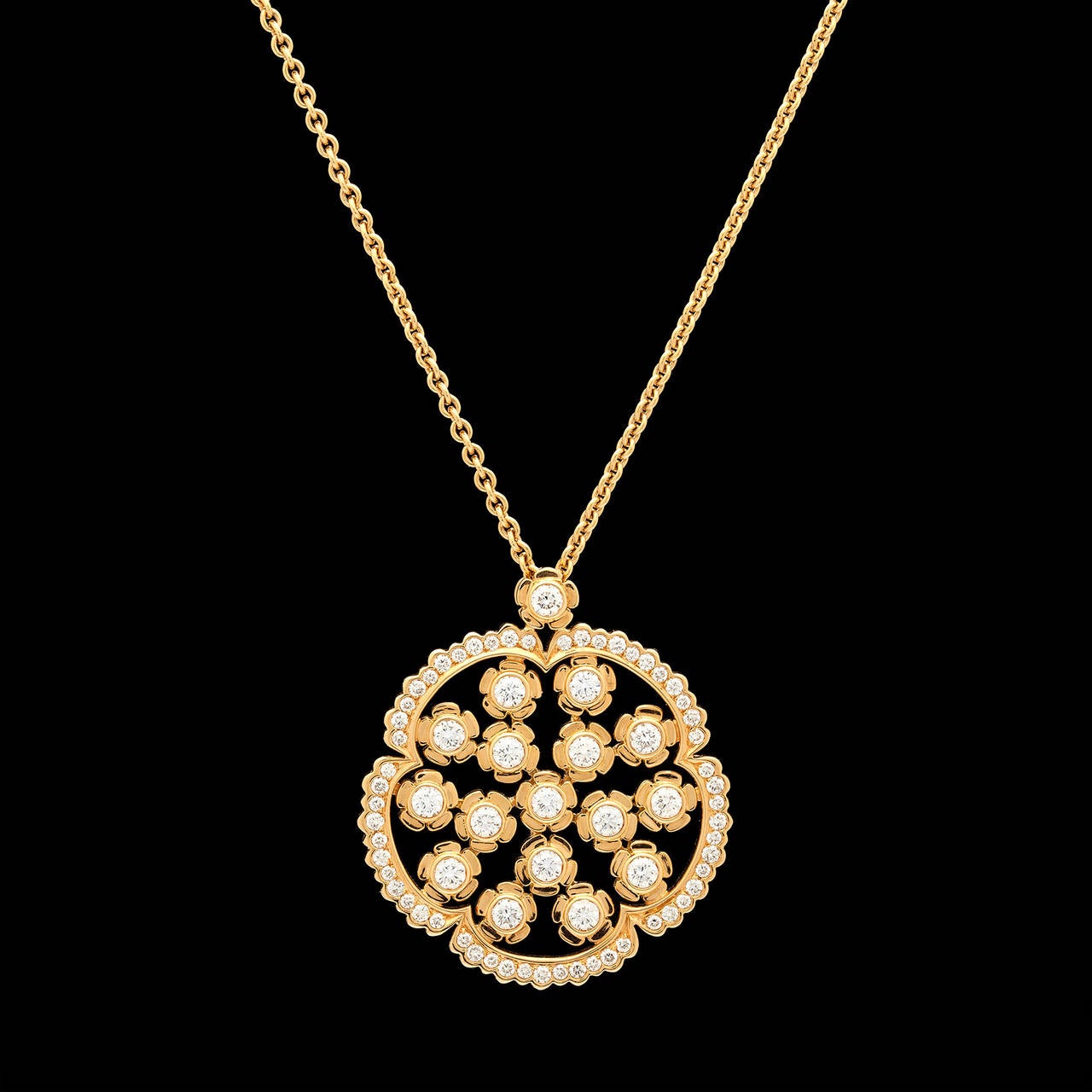 18Kt Yellow Gold Louis Julian Et Fils Necklace Adorned with 28 Round Brilliant Cut Diamonds Enhancing a 33mm Geometric Flower Pendant. The chain can be worn at 14, 15 or 16 inches. Total weight is 18.7 grams.