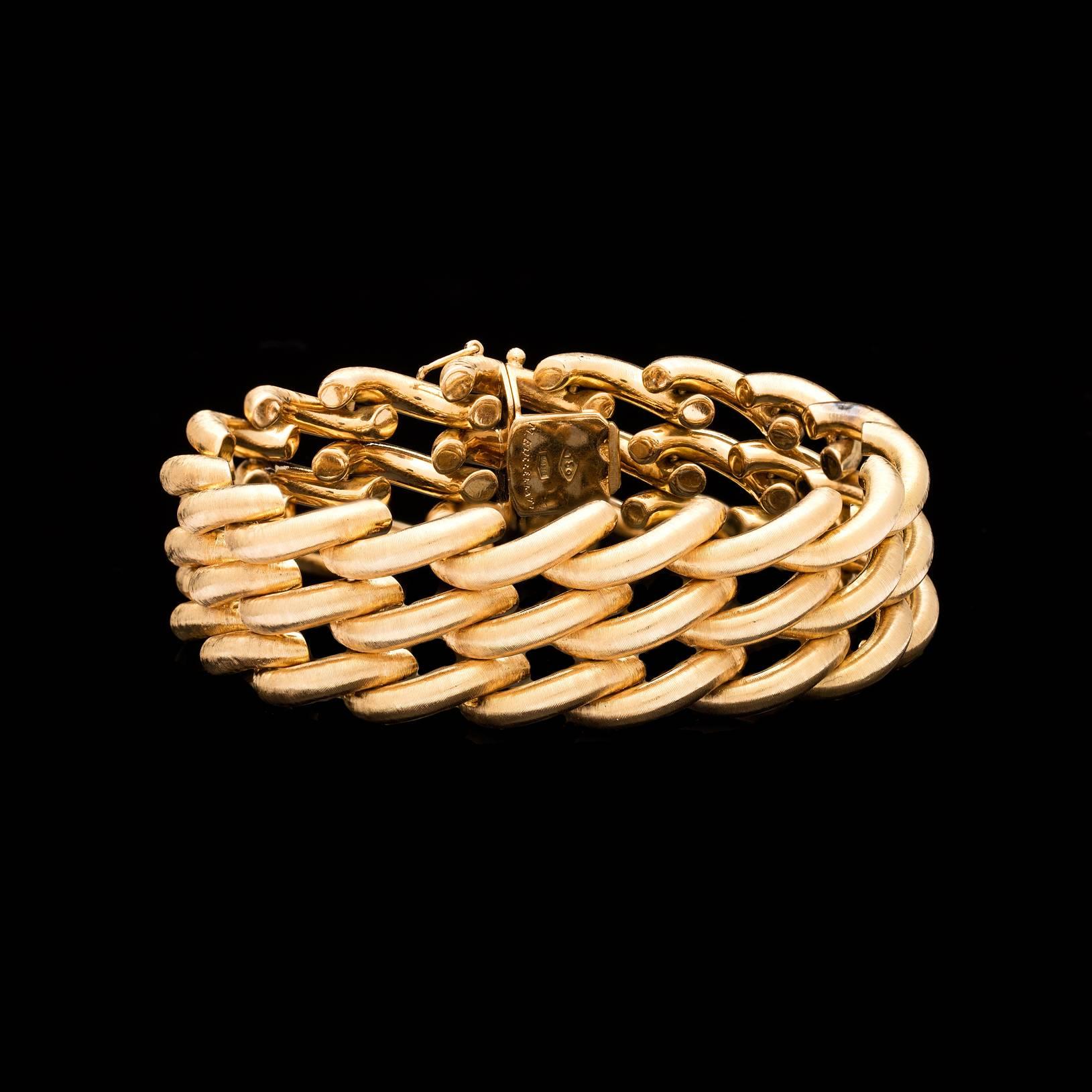 Vintage Buccellati Twist Link Rope Bracelet in 18Kt Yellow Gold from the Retro Period.  The top side of the bracelet is detailed with a matte texture finish, and high polished on the reverse side secured with a tongue-groove clasp.   The weight is