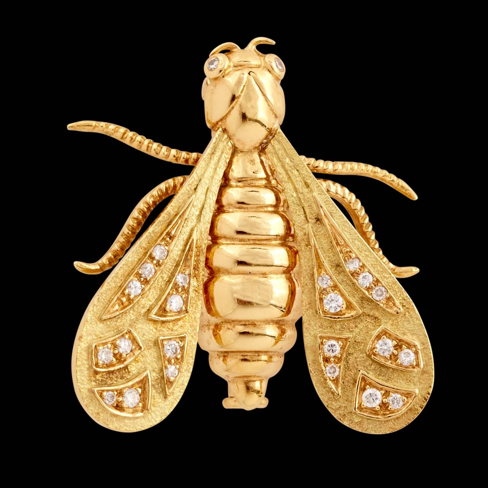 Chaumet 18Kt Yellow Gold Bee Pin is Detailed with 24 Round Brilliant Cut Diamonds on its Wings, Totaling Approximately 0.20 Carats. This pin measures 1 inch in diameter & weighs 6.2 grams. A Certificate of Authenticity with individual serial number