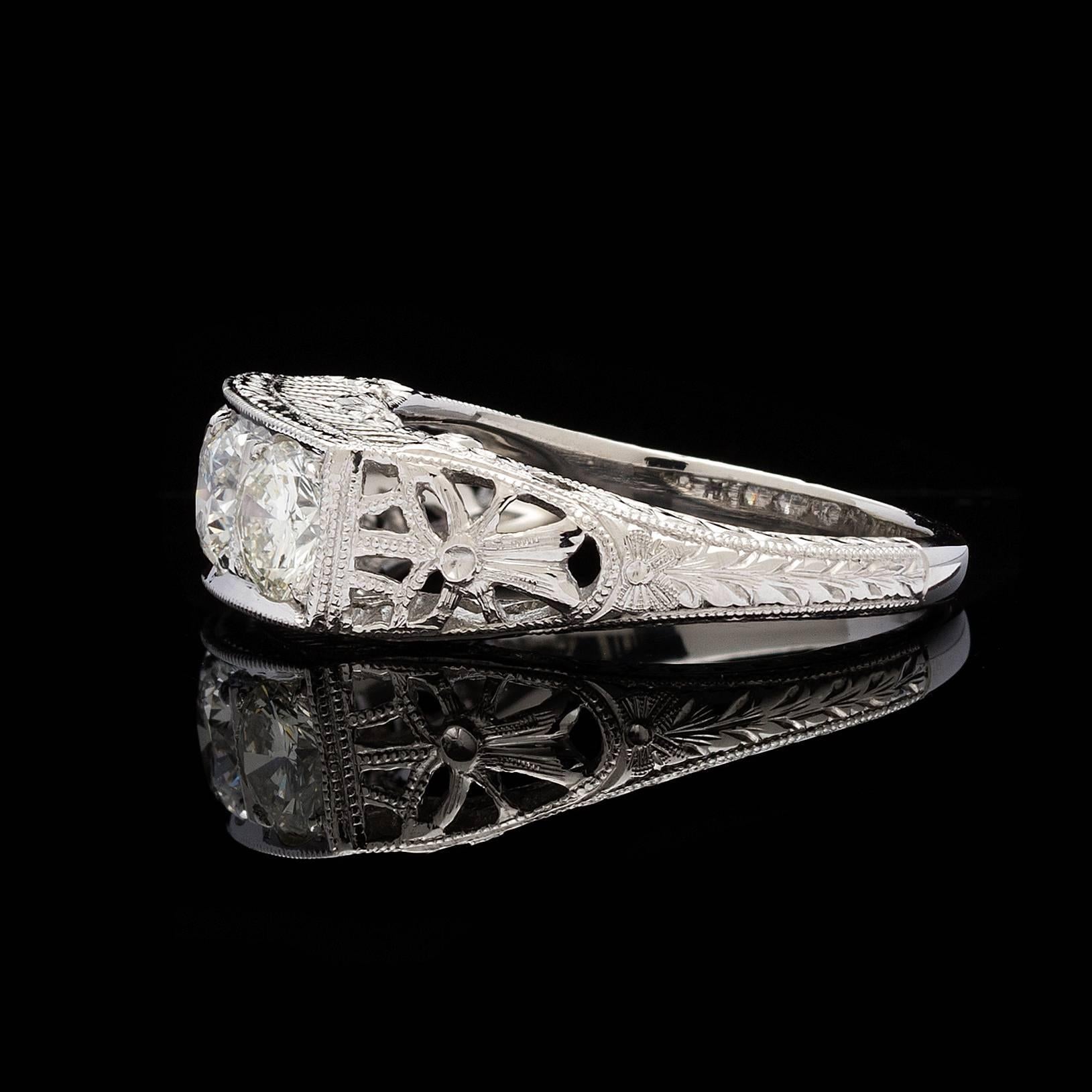 Art Deco 1.38 Carats Diamonds Platinum Filigree 3-Stone Ring