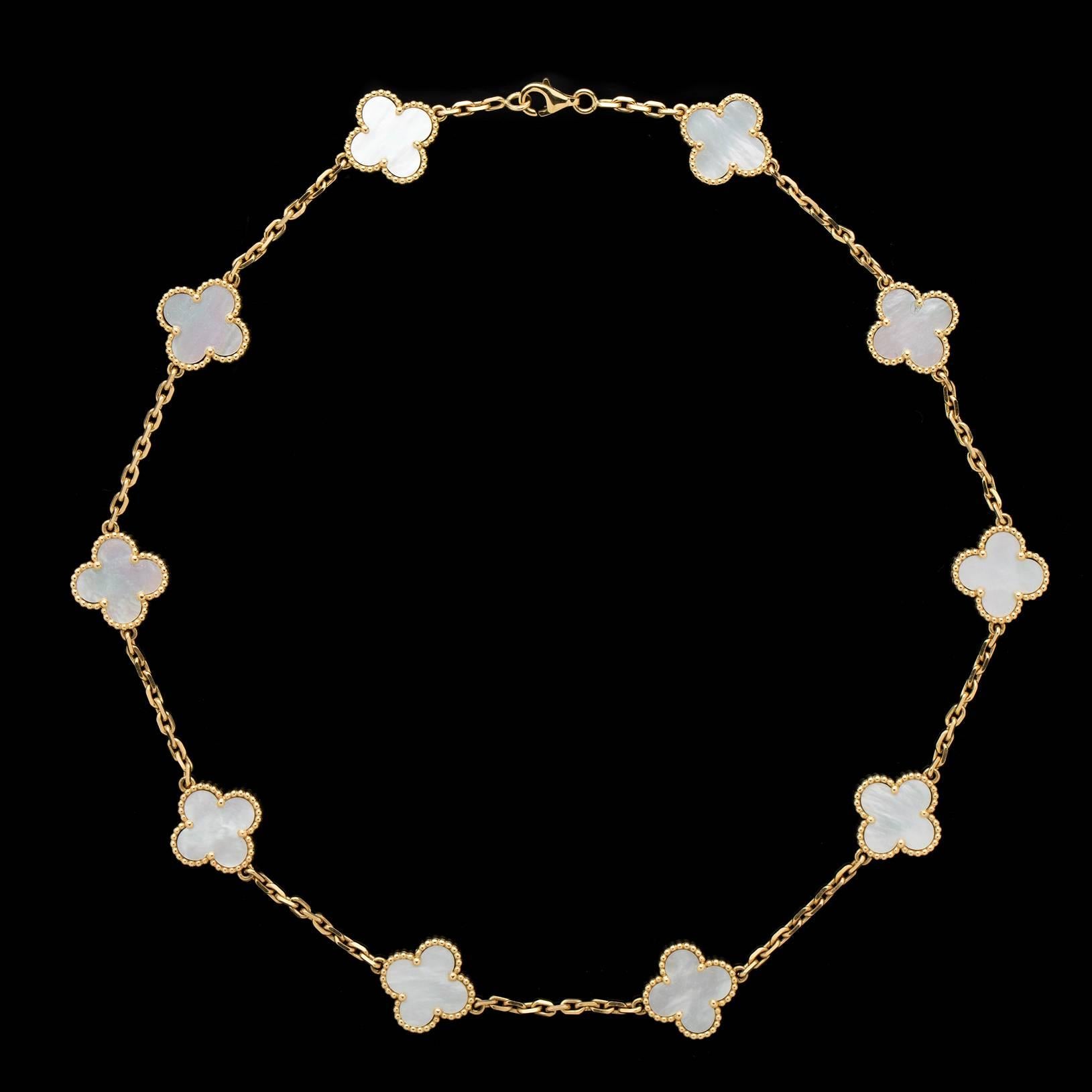 Van Cleef & Arpels iconic Alhambra 16 inch gold link necklace with 10 mother of pearl clover motifs. The clover each measures 14.6 x 14.5mm. Total weight of the necklace is 25.2 grams. Original packaging included. This VCA Alhambra necklace is a